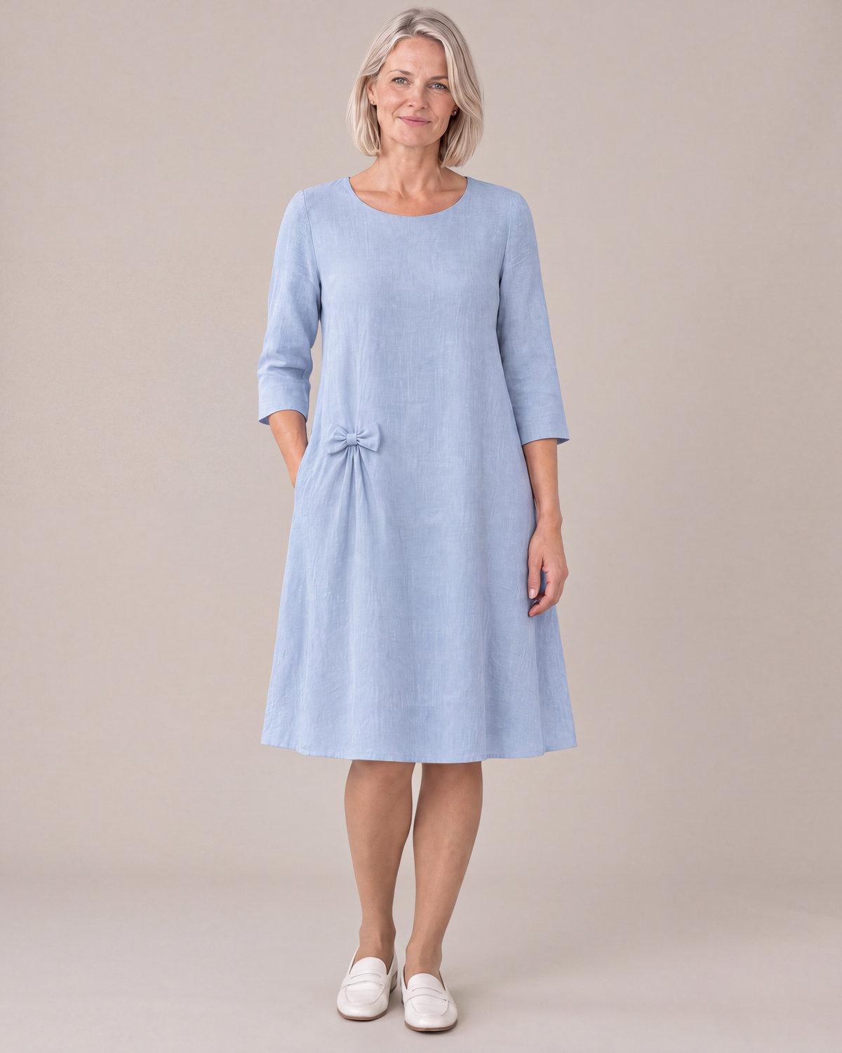 ADELE linen swing dress in light blue with small hip bow, front view