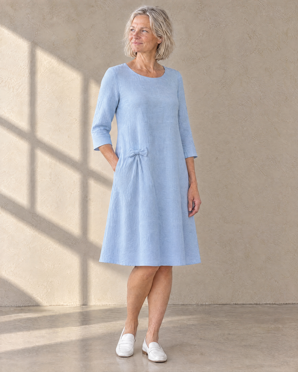 ADELE light blue linen swing dress, three-quarter view
