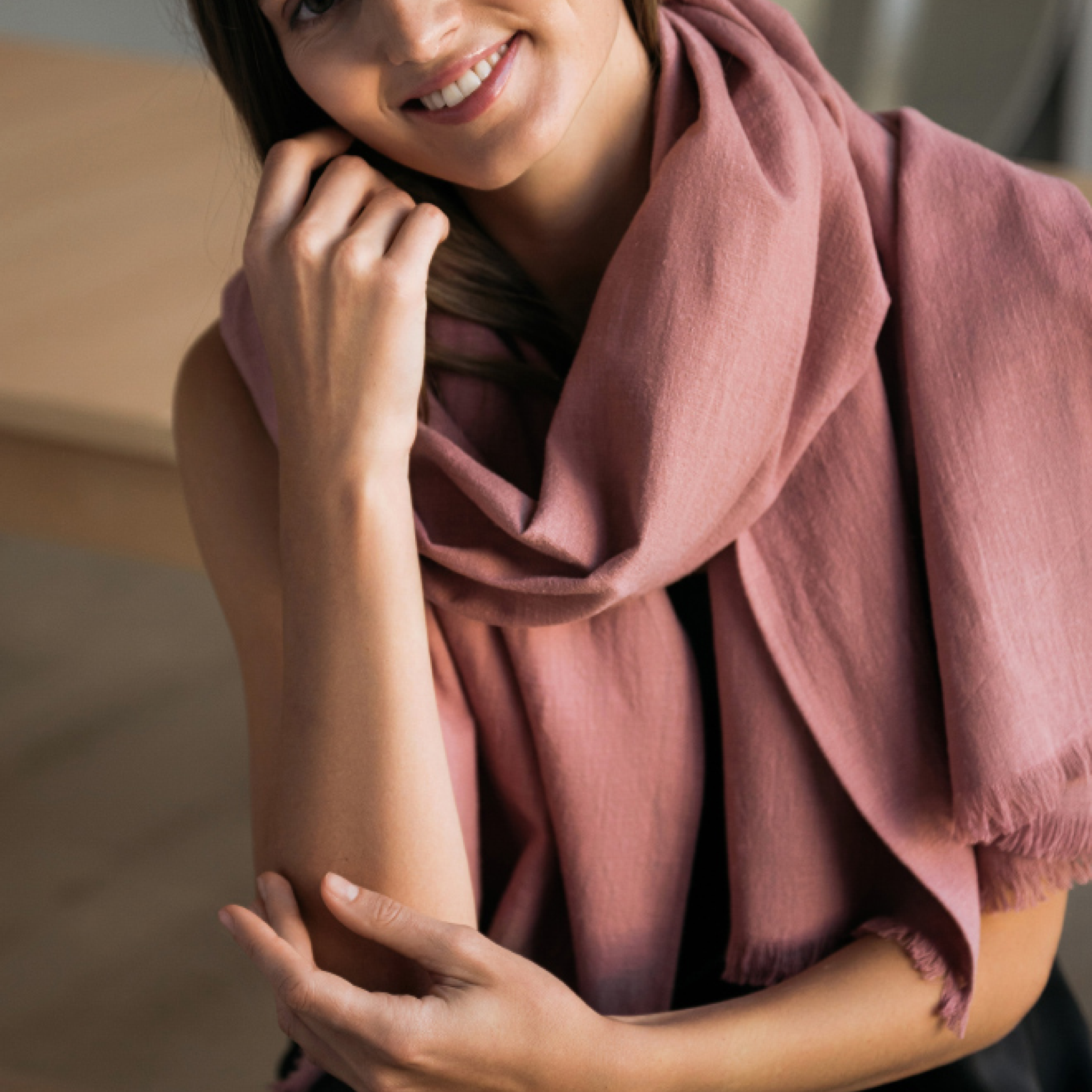 A dusty rose linen scarf, shown folded. #Color_Dusty rose
