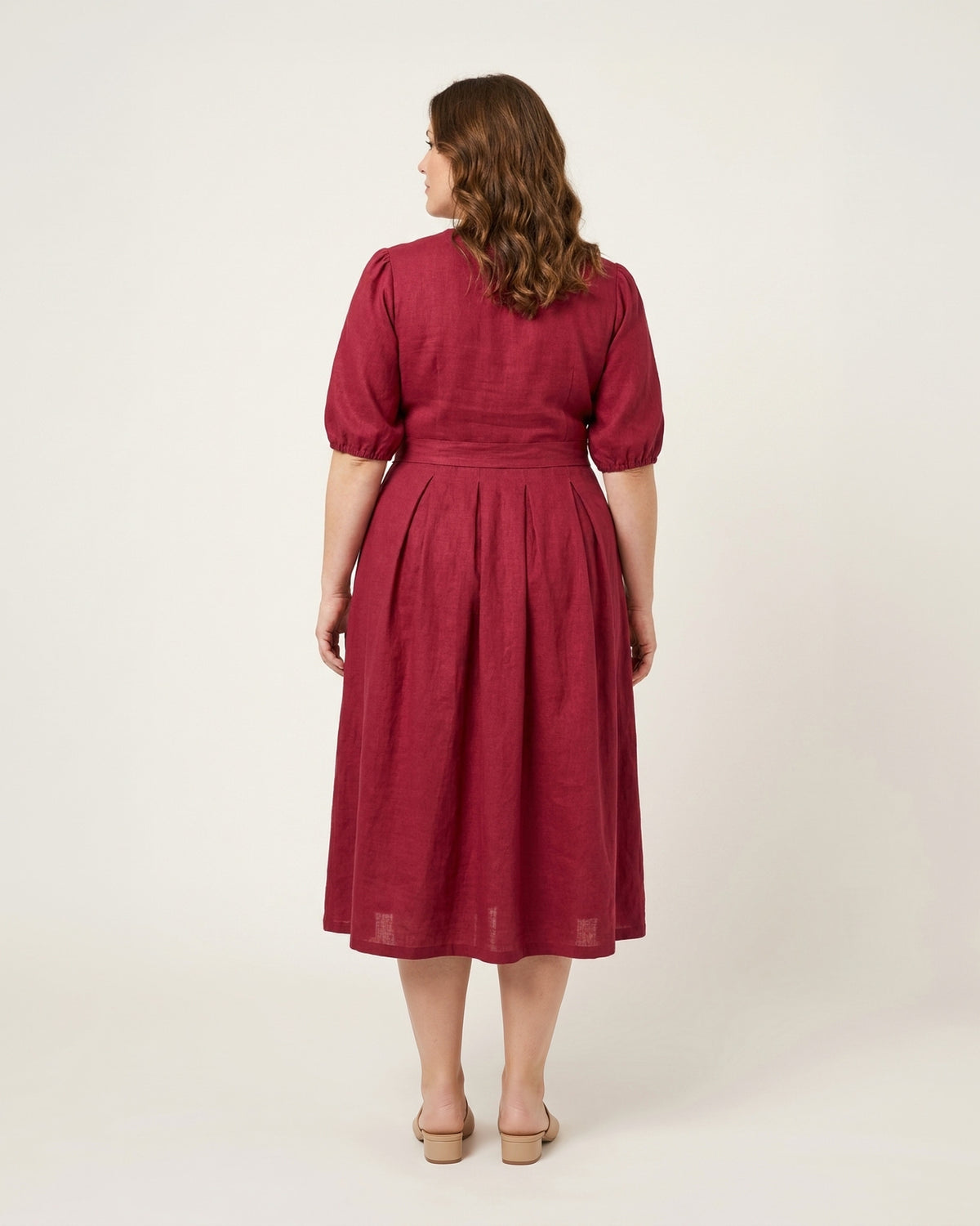 BONNIE SUPERSTAR – Linen Blend Puff Sleeve Tie-Waist Dress — Plus Size – cerise linen dress, full-length back view in the studio #Color_Cerise