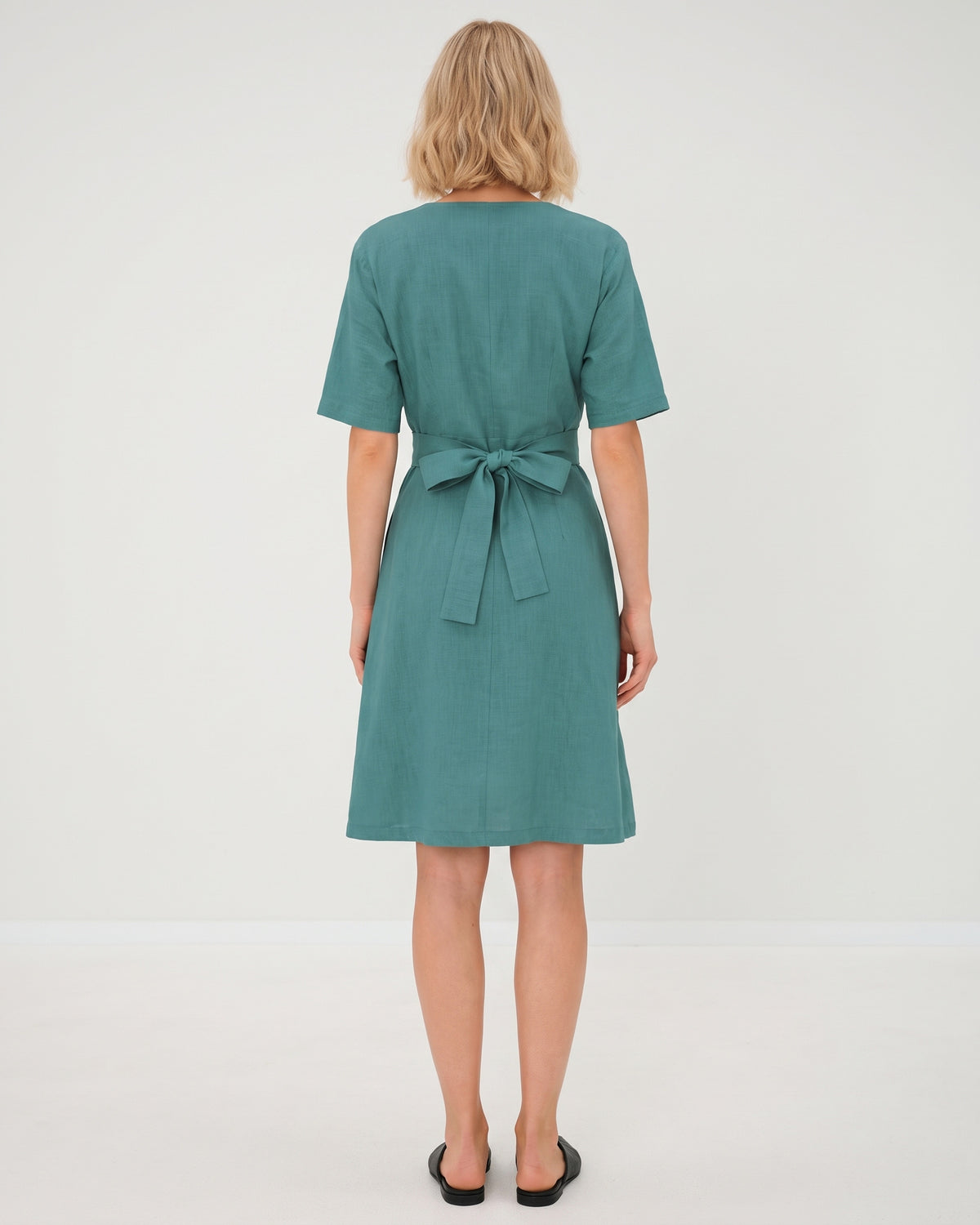 LeMuse CHLOE linen dress in teal – studio back view #Color_Teal