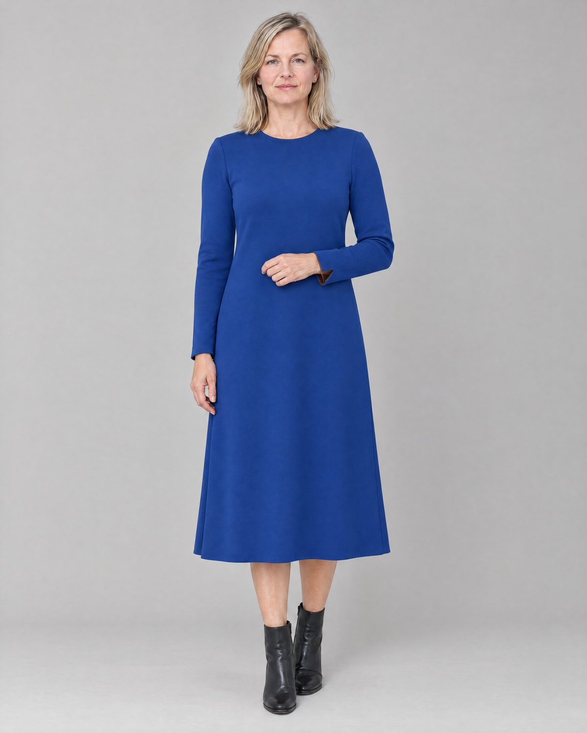 COATFIT A-line midi dress in cobalt blue Punto knit, front view, long narrow sleeves with double cuffs
