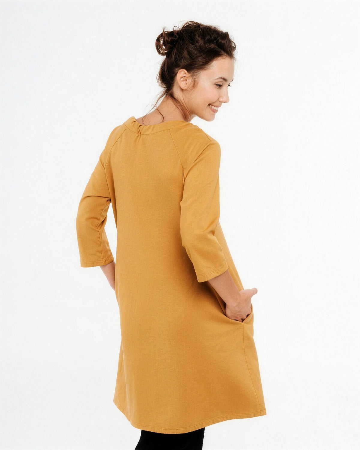 FRENCH – Italian Punto Milano Ribbon Neck A-Line Dress – yellow dress, back view: raglan three-quarter sleeves and relaxed A-line back, hand in the side pocket #Color_Yellow