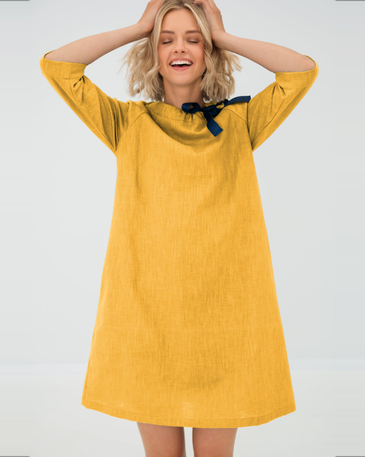 LeMuse FRENCH linen dress in yellow – model hands up in motion #Color_Yellow