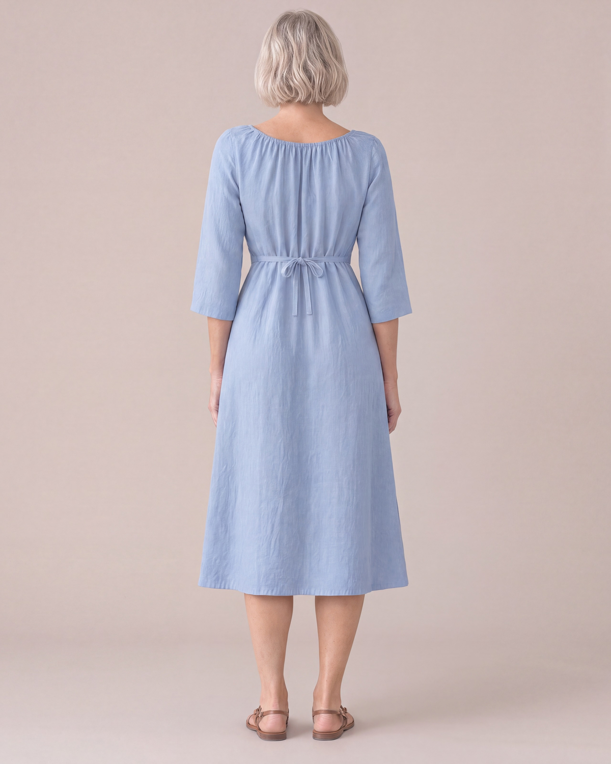 HELENA linen dress in Light Blue, back view with tied waist