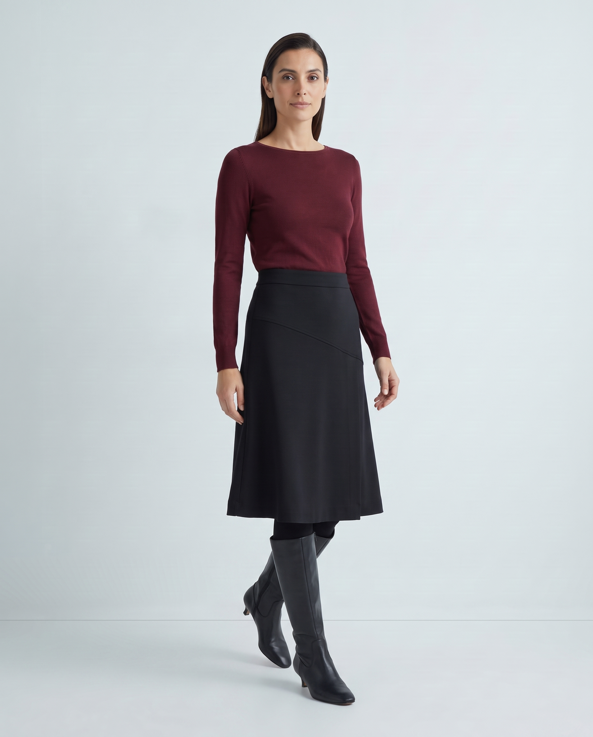 MIDNIGHT black A-line midi skirt in motion