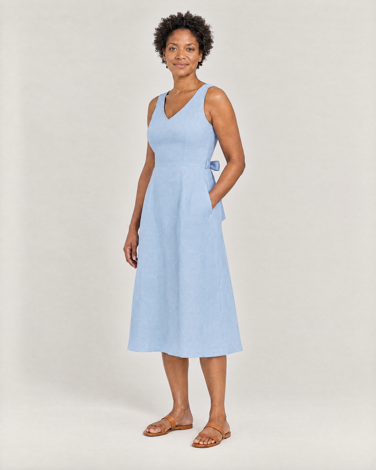 DAYLIGHT light blue linen A-line midi dress, three-quarter view