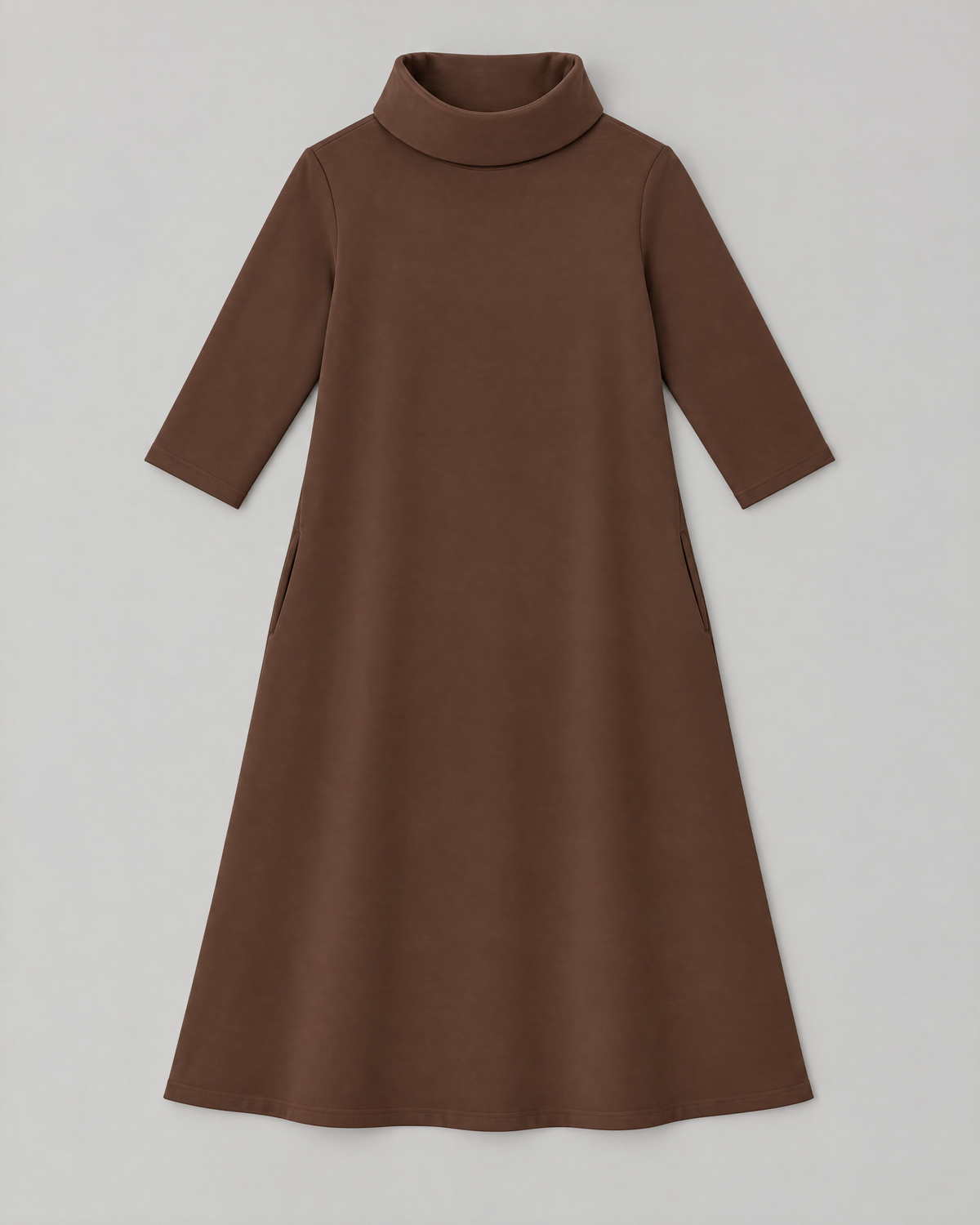 KIND A-line midi dress in Brown, laid flat, showing the A-line shape