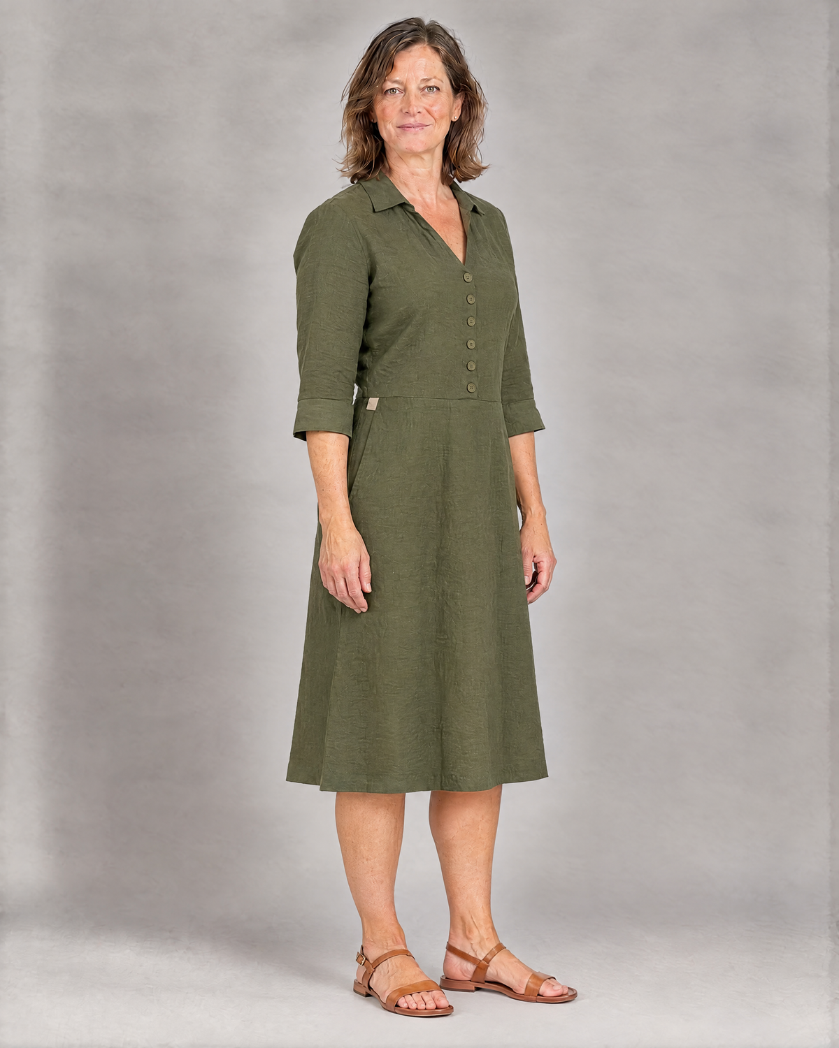 CARRY olive green linen A-line midi shirt dress, three-quarter view with beige tab at the waist