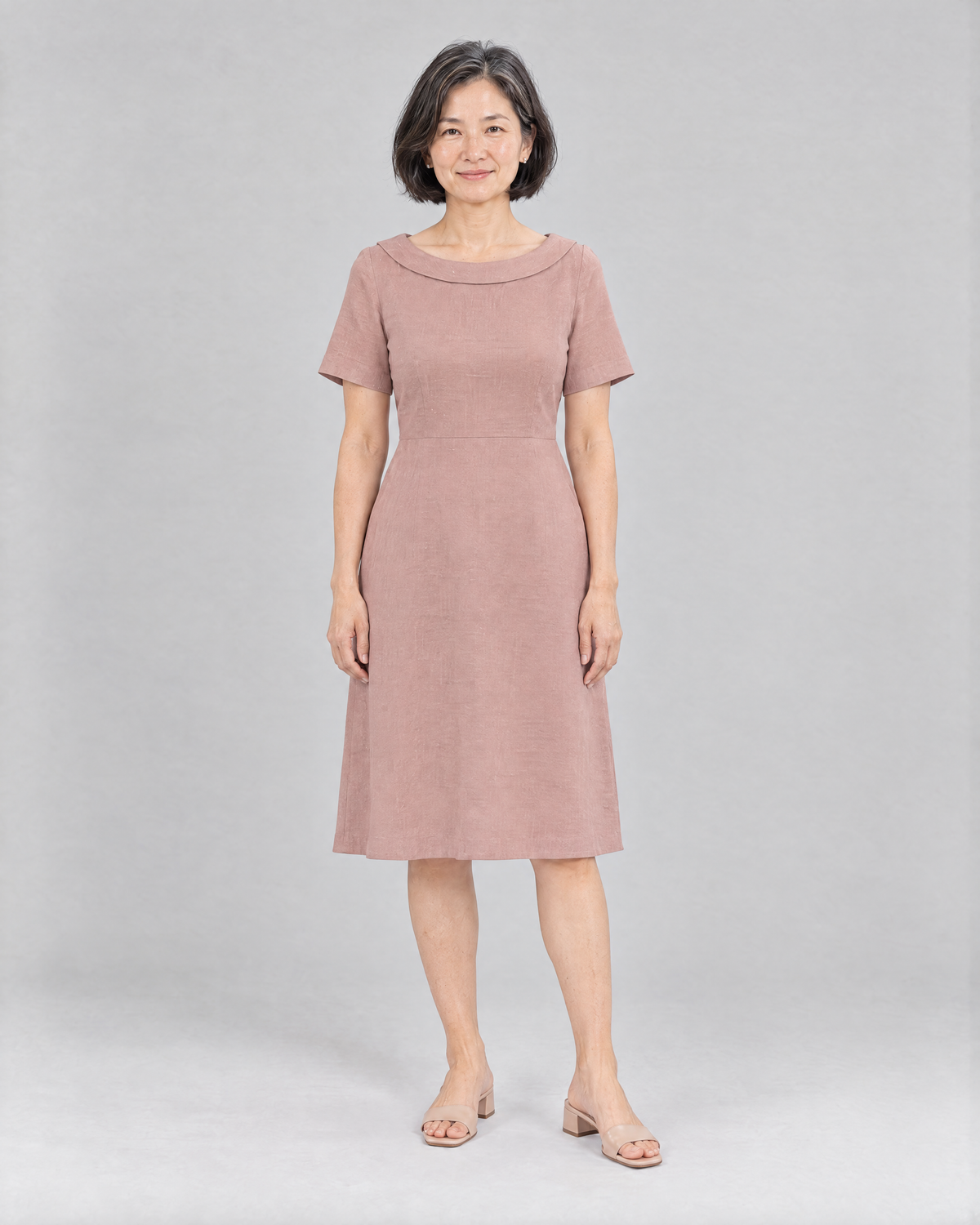 STORY PETITE Dutch linen A-line dress in Dusty Rose, front view on a petite model