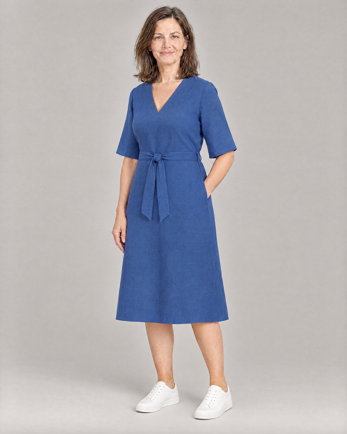 PASSPORT blue linen A-line midi dress with elbow sleeves, three-quarter view