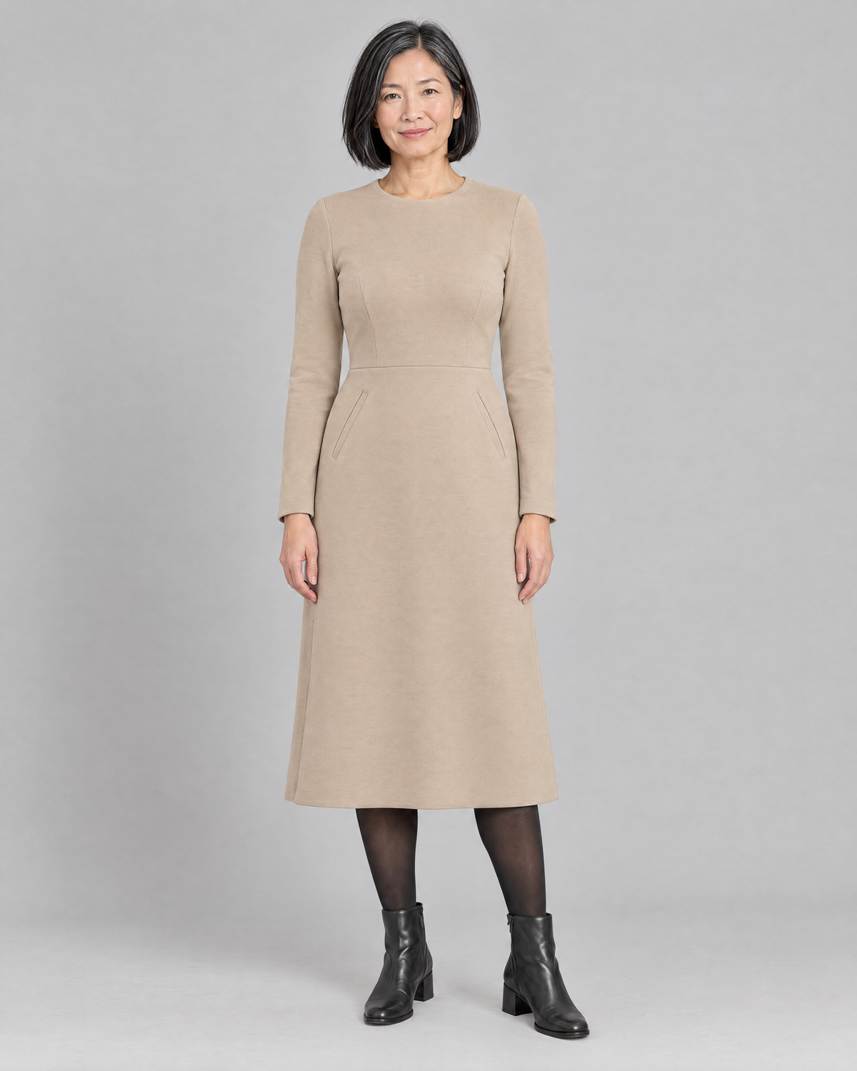GLIDE beige wool A-line midi dress with long sleeves and welt pockets, front view
