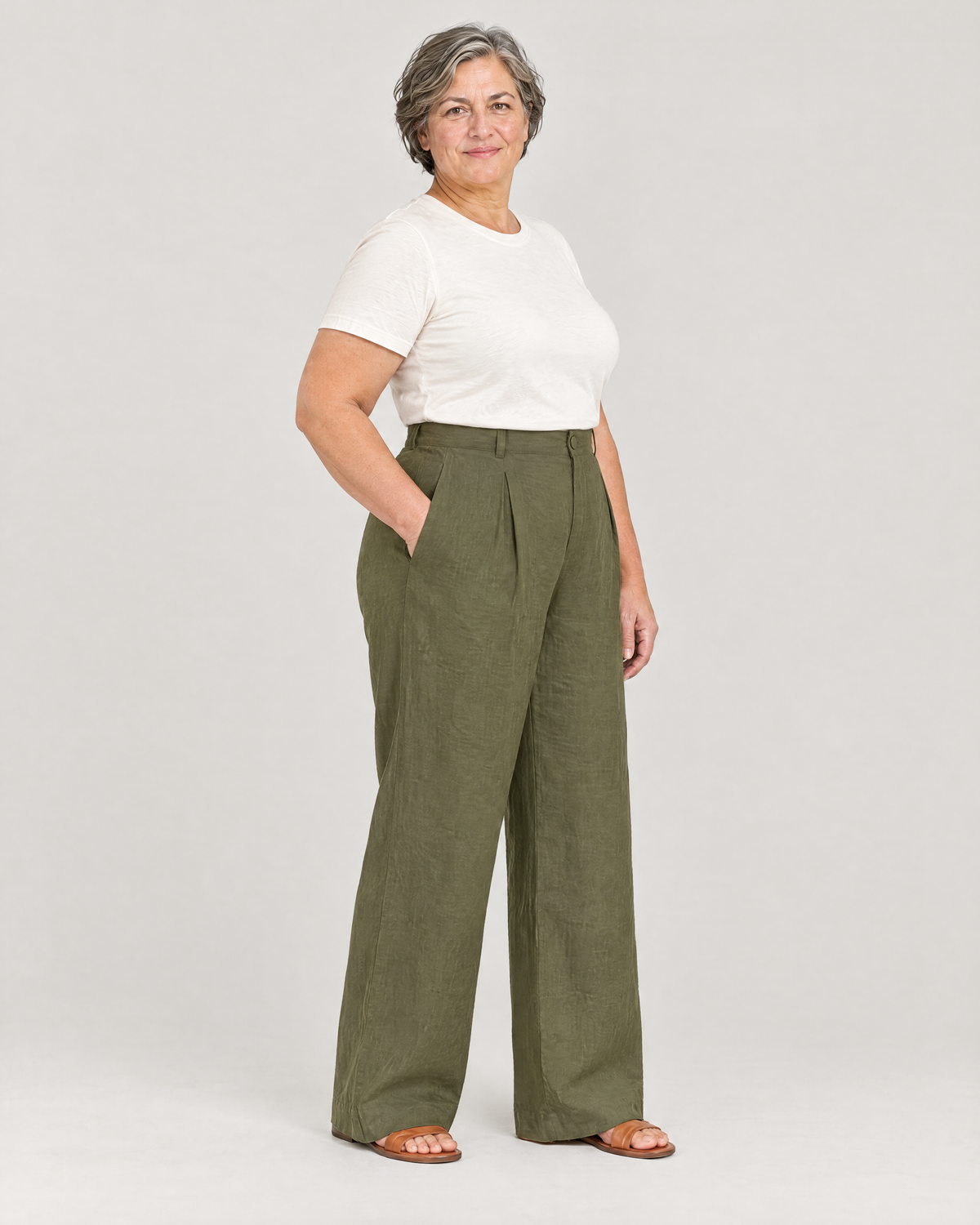 LYRA OPAQUE olive green linen wide-leg trousers, three-quarter view
