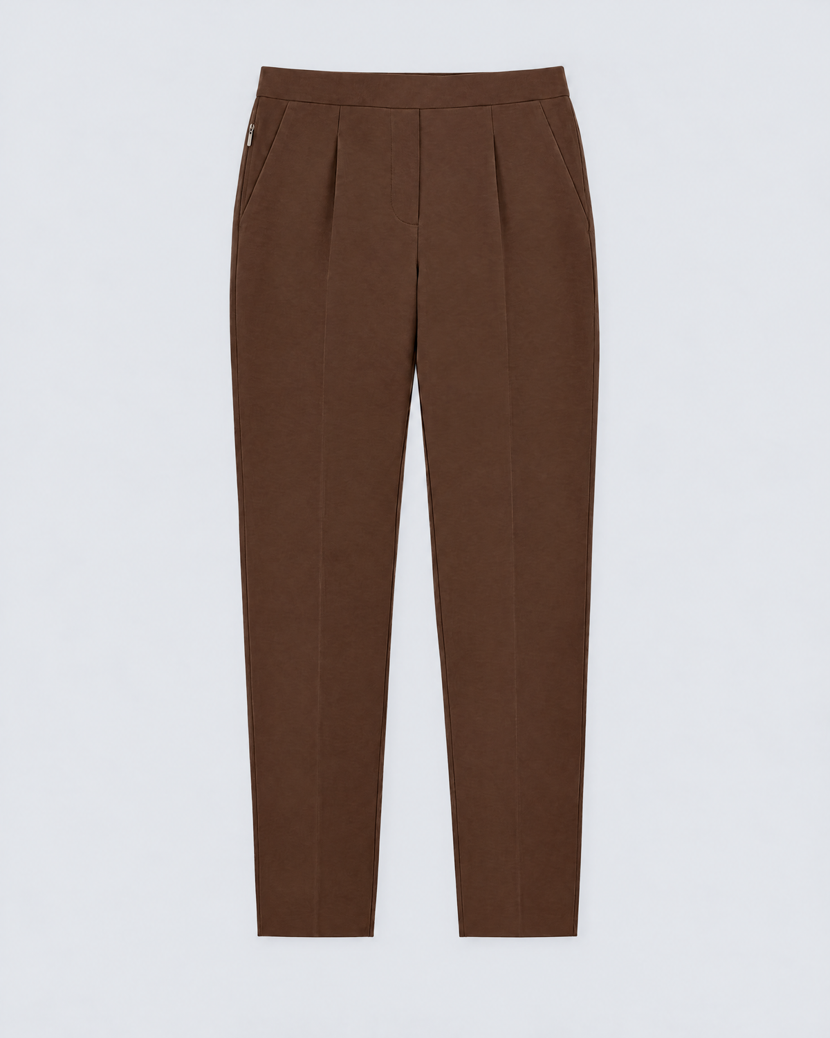 SIT WELL brown tapered trousers laid flat, showing the zipped pocket in the right side seam