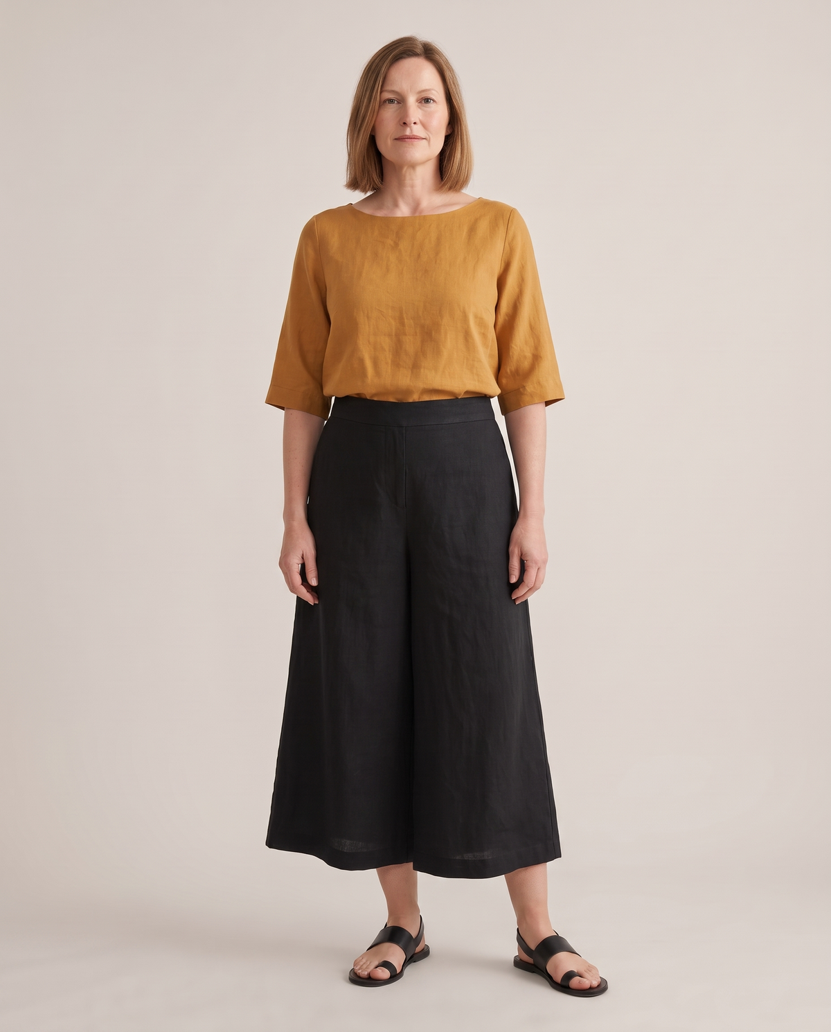 SWAY linen midi culottes in Black, front view, looking like an A-line skirt