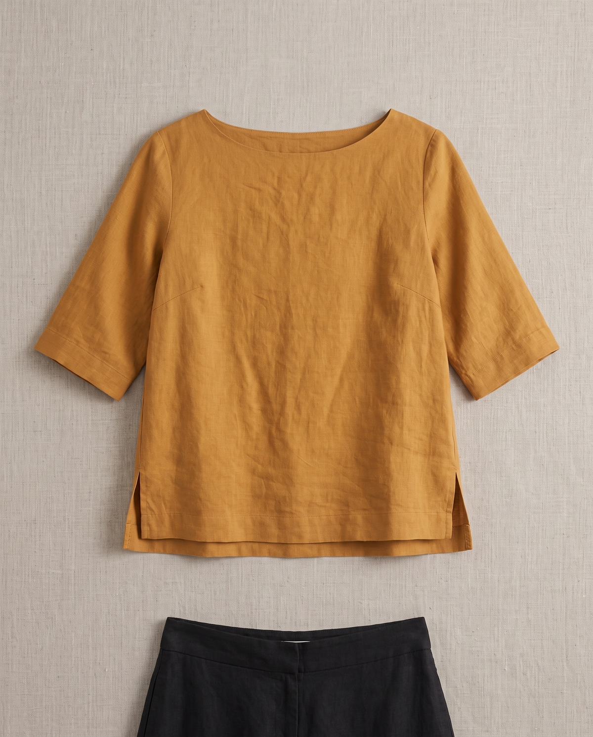LIFT linen boat-neck top in Ochre laid flat