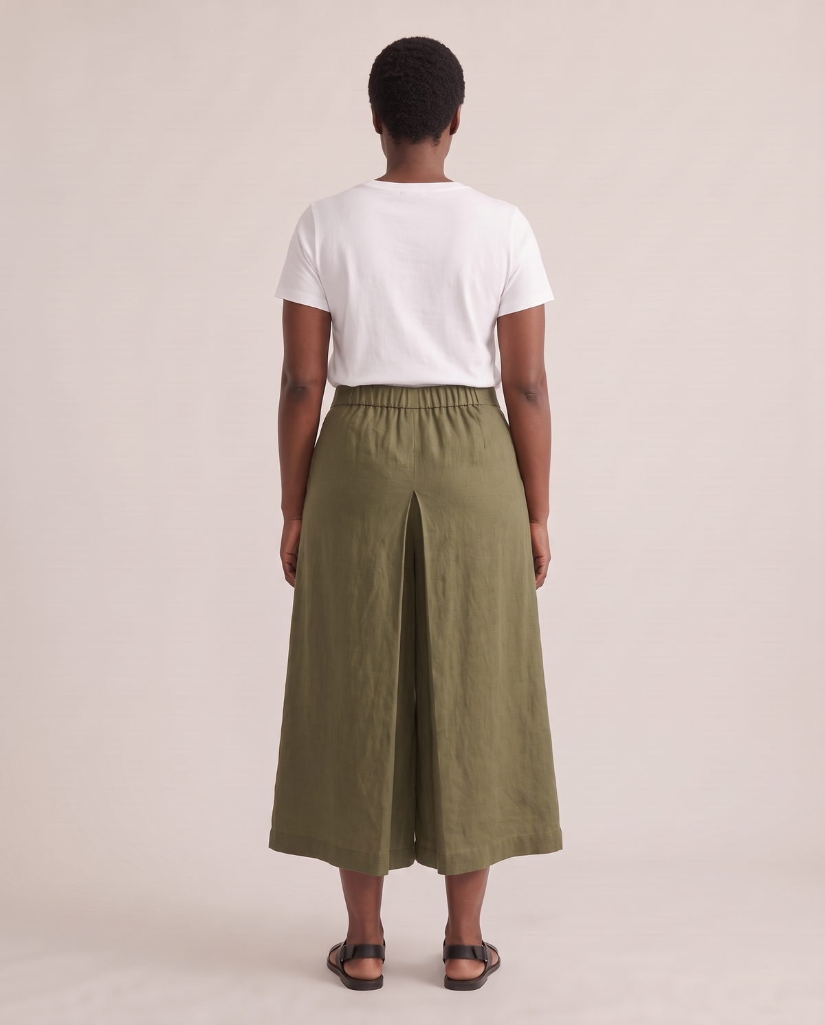 SWAY linen culottes in Olive Green, back view with inverted pleat
