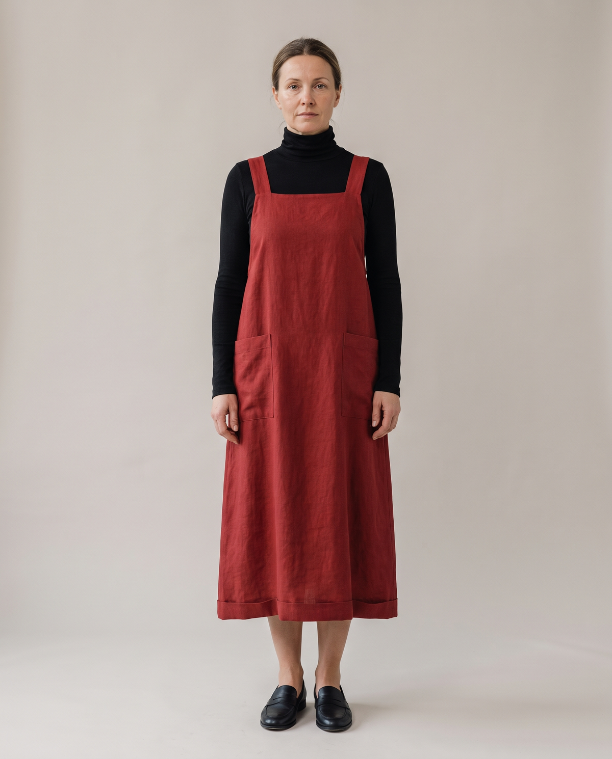 LAYER linen pinafore dress in Red, front view with square neckline and patch pockets