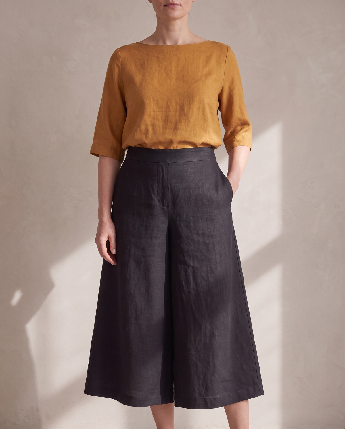 SWAY linen midi culottes in Black worn with the LIFT Ochre linen top