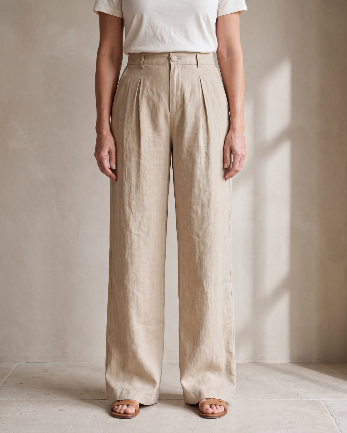 LYRA OPAQUE Beige linen pleated wide-leg trousers, close front view