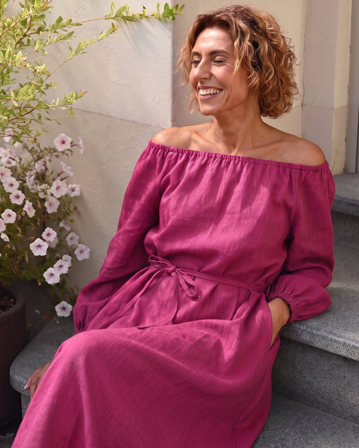 MOON – Cerise off-shoulder linen midi dress, lifestyle on steps #Color_Cerise