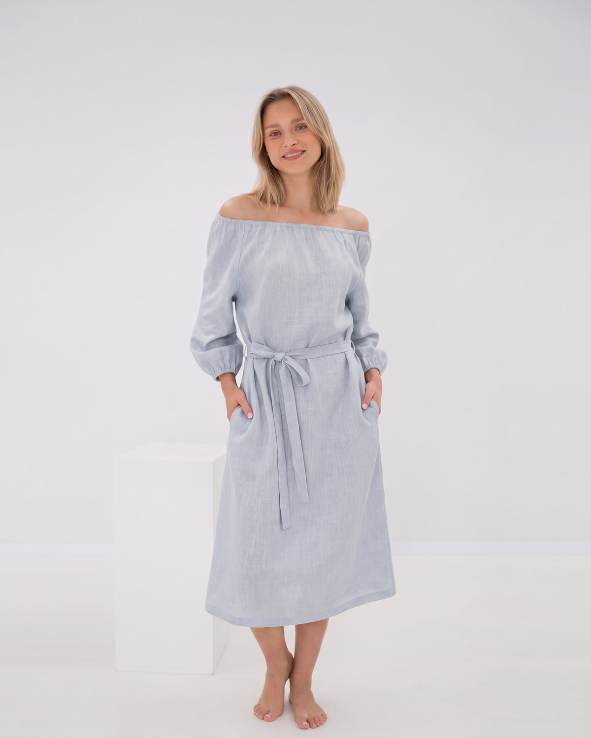 MOON – Light blue off-shoulder linen midi dress, front view full length in studio #Color_Light blue