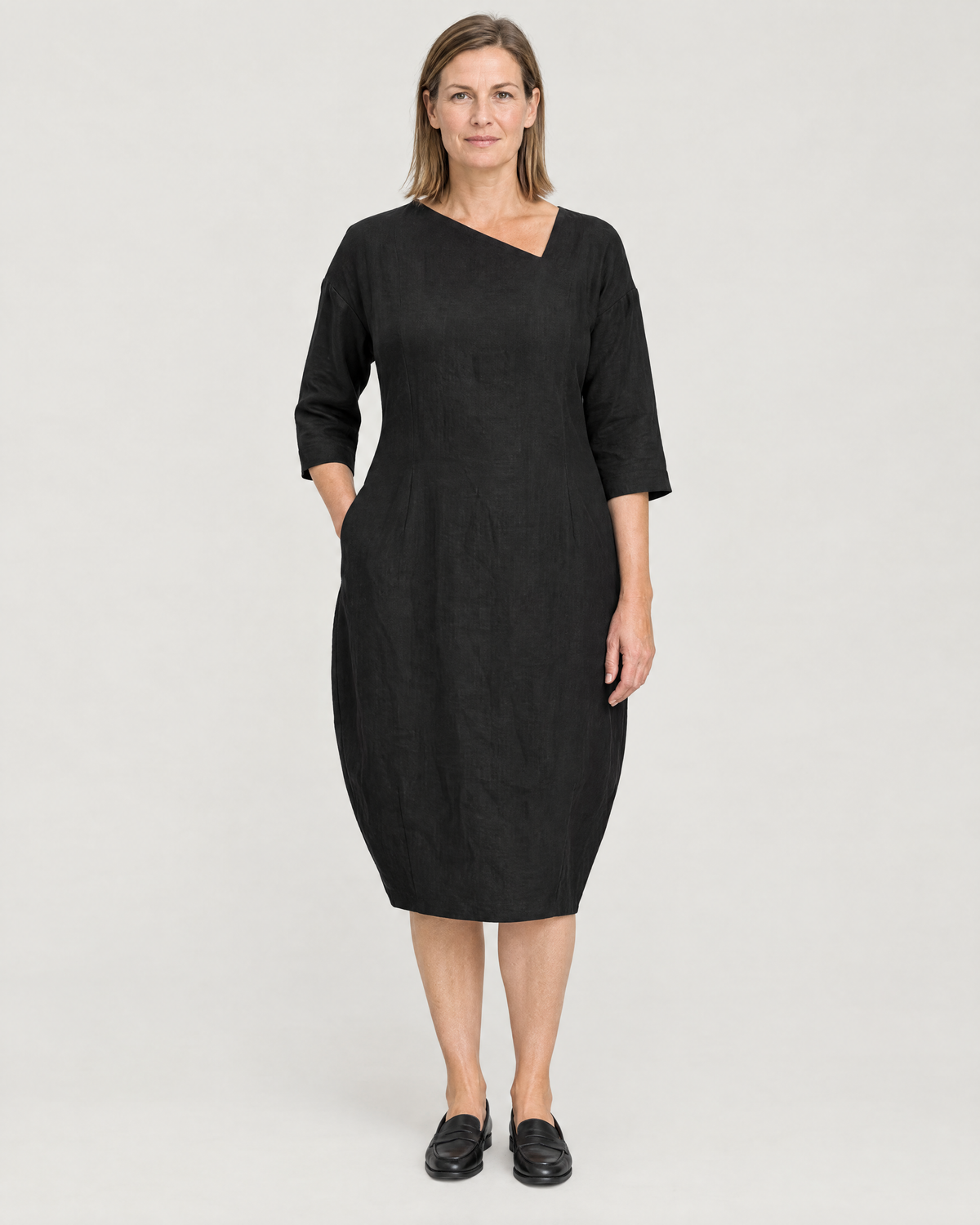 SHAPE linen cocoon midi dress in Black, front view with asymmetric neckline