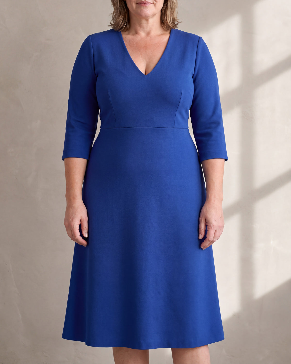 STORY CURVE cobalt Punto Milano V-neck A-line dress, close front view