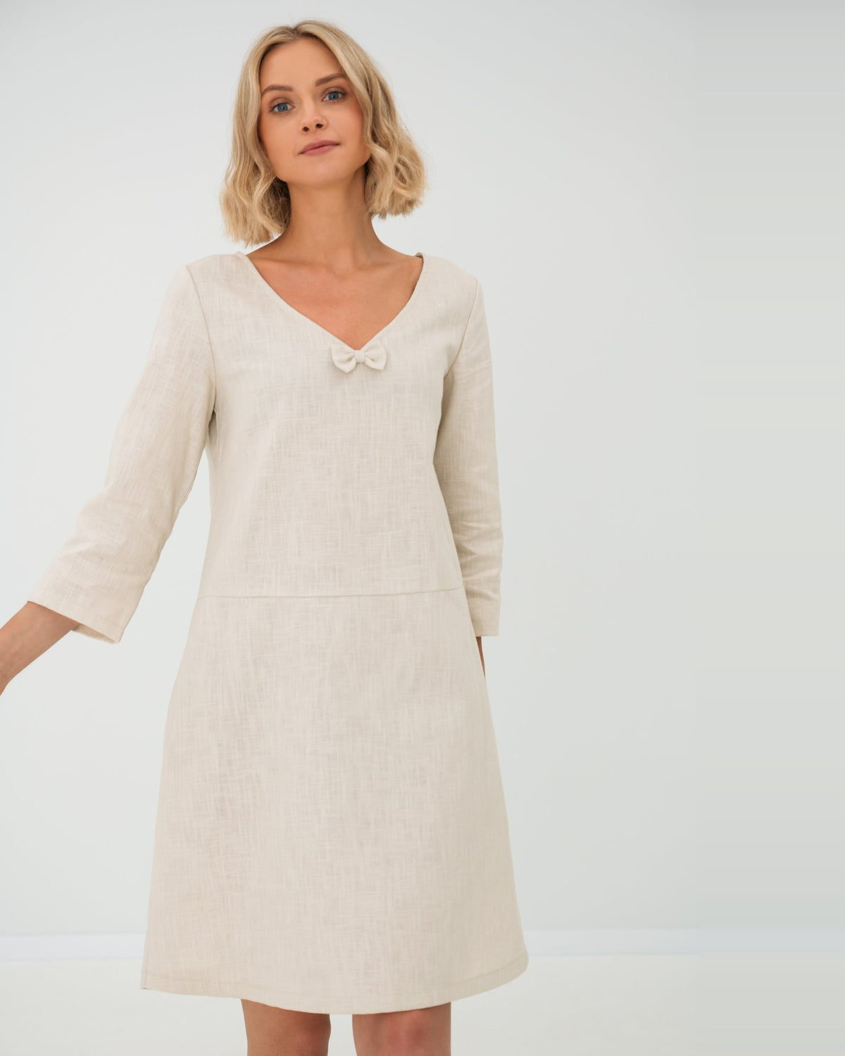SUN – Linen Blend V-Neck Bow Dress – Beige dress, front view in motion, studio #Color_Beige