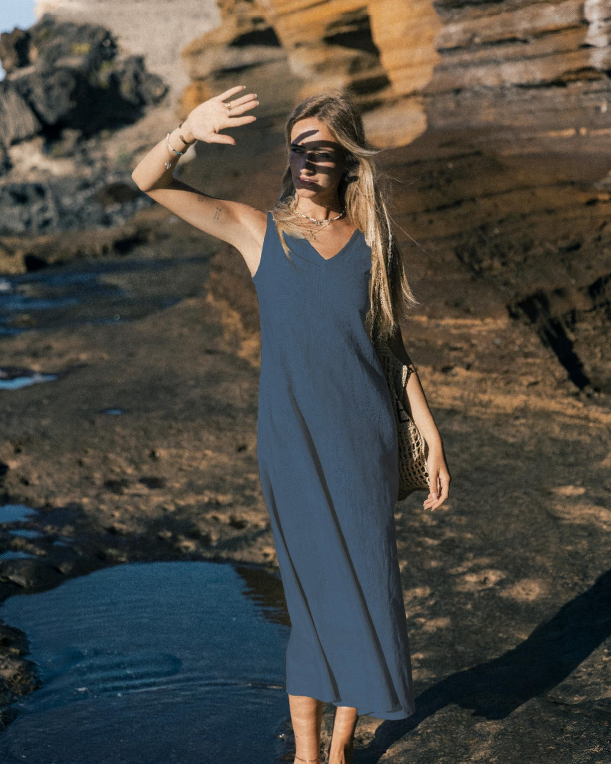 LeMuse SUNSET linen dress in blue – model front full length by the cliffs #Color_Blue