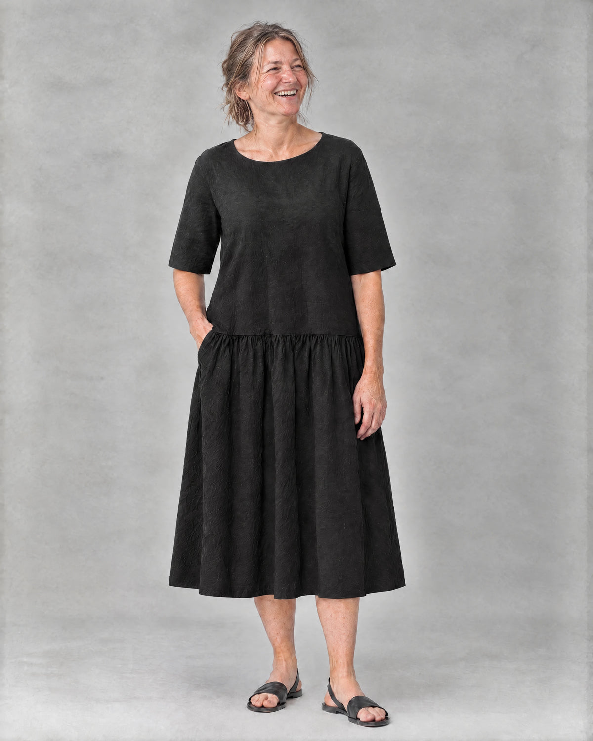 TESSA black linen tiered midi dress, full-length front view