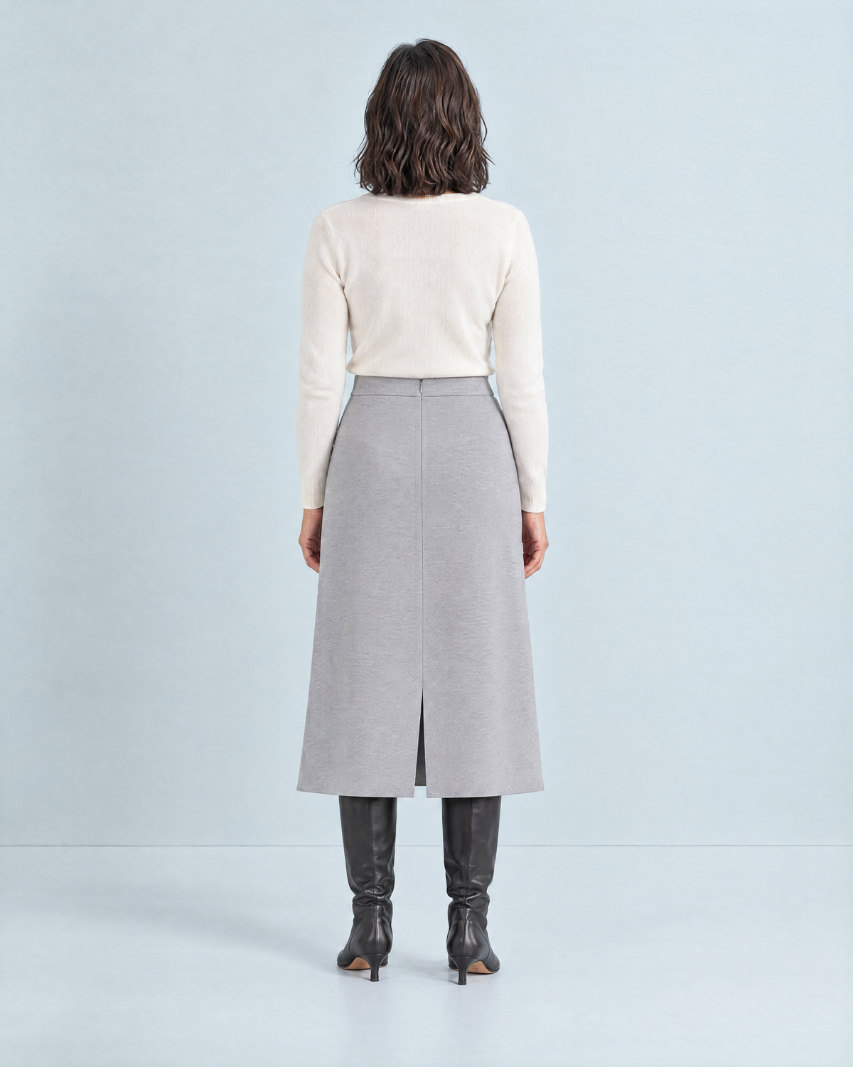 WINTER MIDI wool midi skirt in Light Grey, back view with concealed zip and walking vent