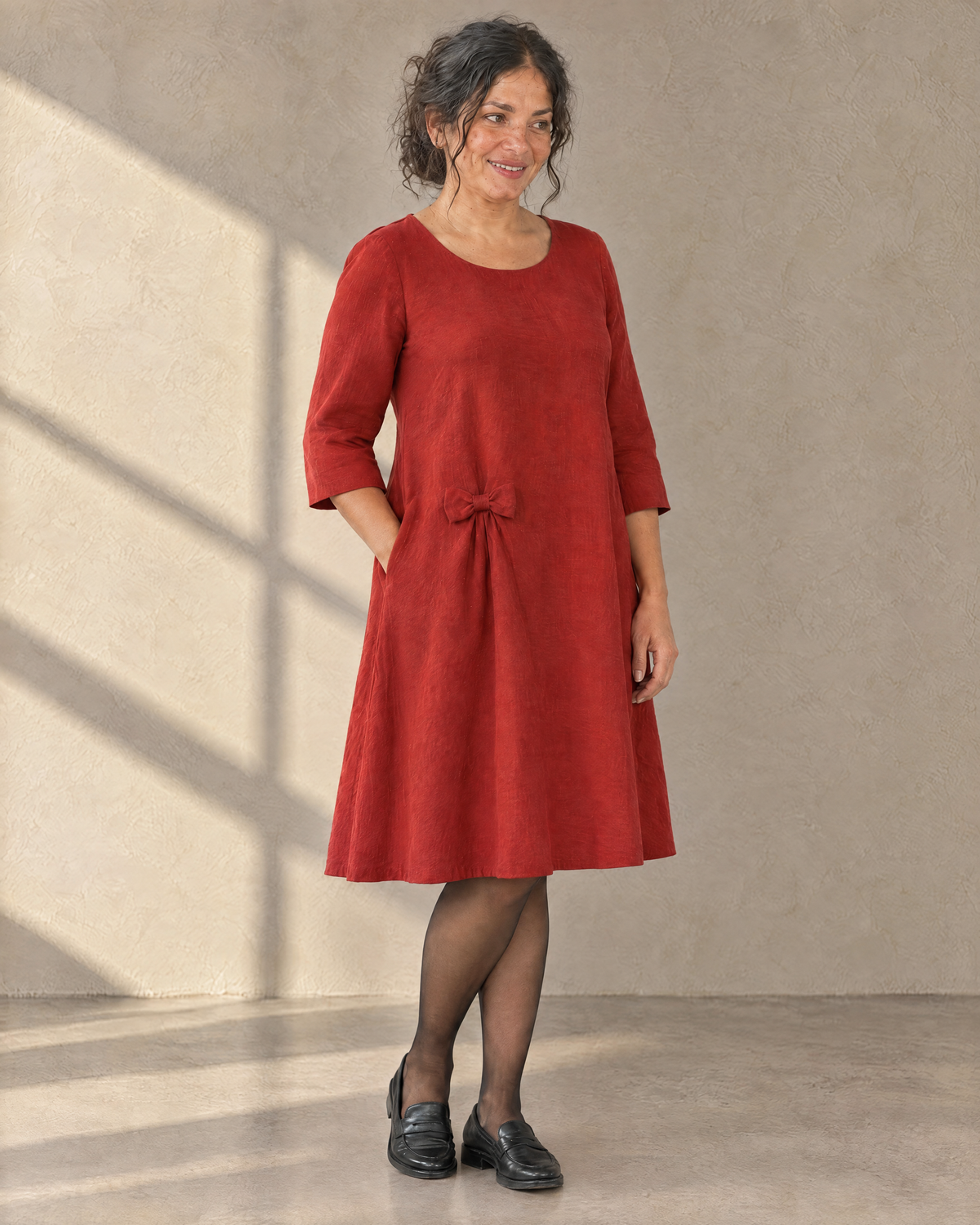 ADELE red linen swing dress, three-quarter view