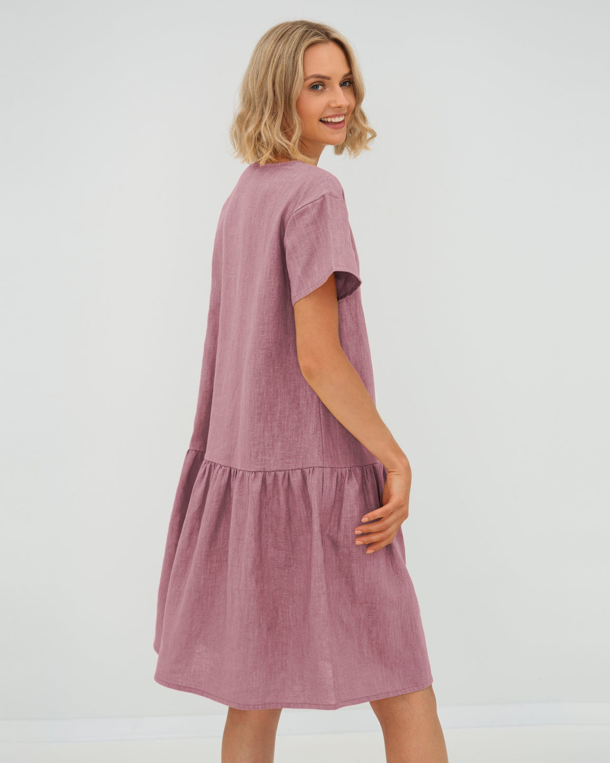 LeMuse BLOSSOM linen dress in dusty rose – studio back, looking over shoulder #Color_Dusty rose