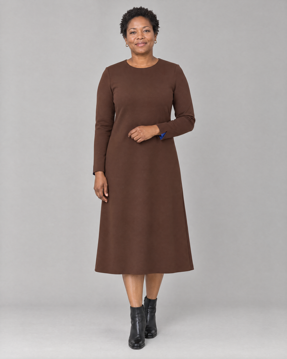 COATFIT A-line midi dress in brown Punto knit, front view