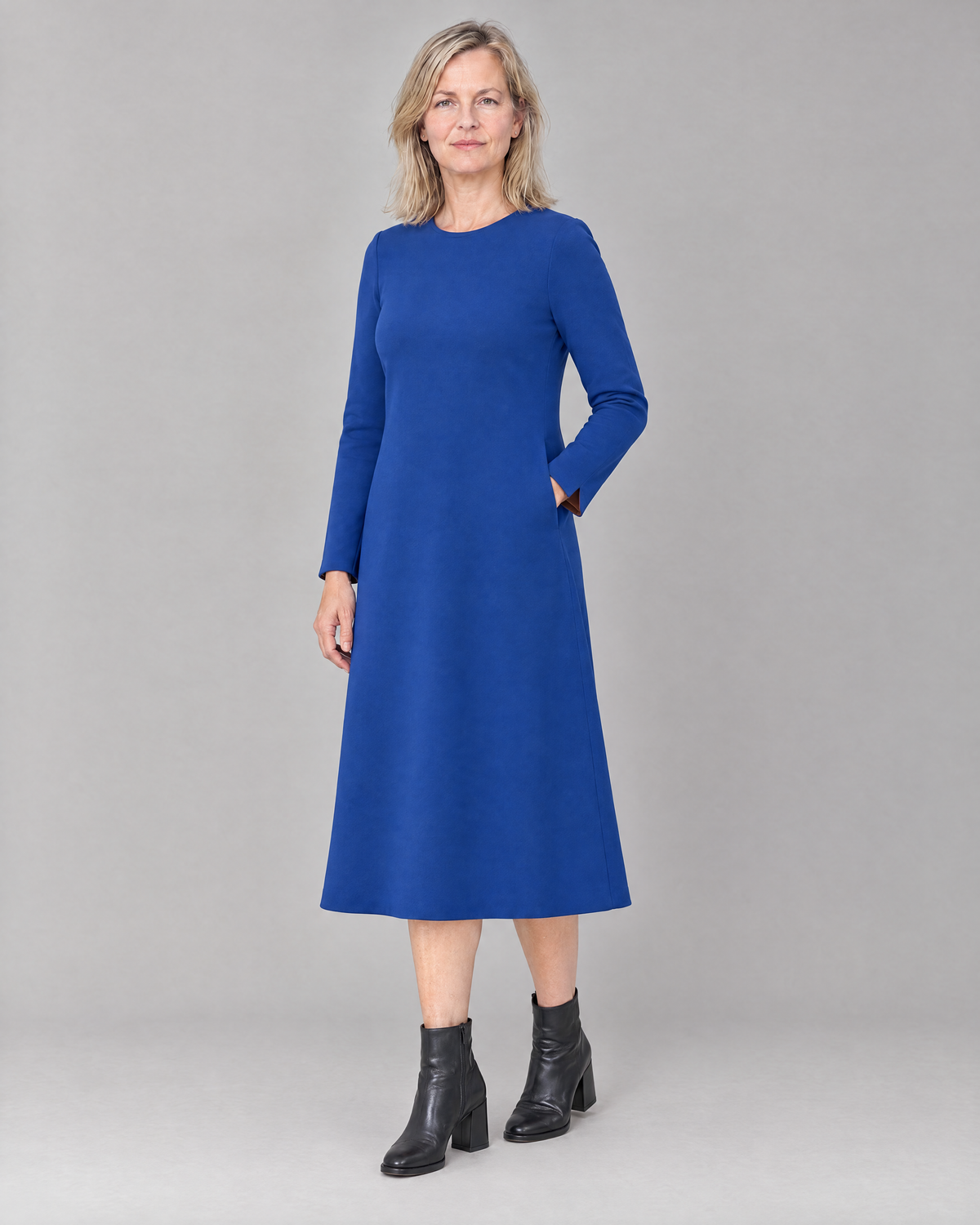 COATFIT cobalt blue midi dress, three-quarter view showing the gentle A-line