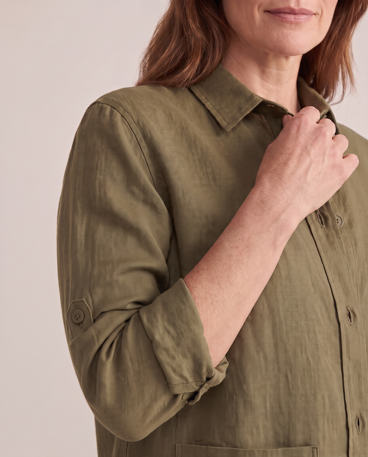 COVER shirt jacket in Olive Green, detail of rolled sleeve with button tab and cuff
