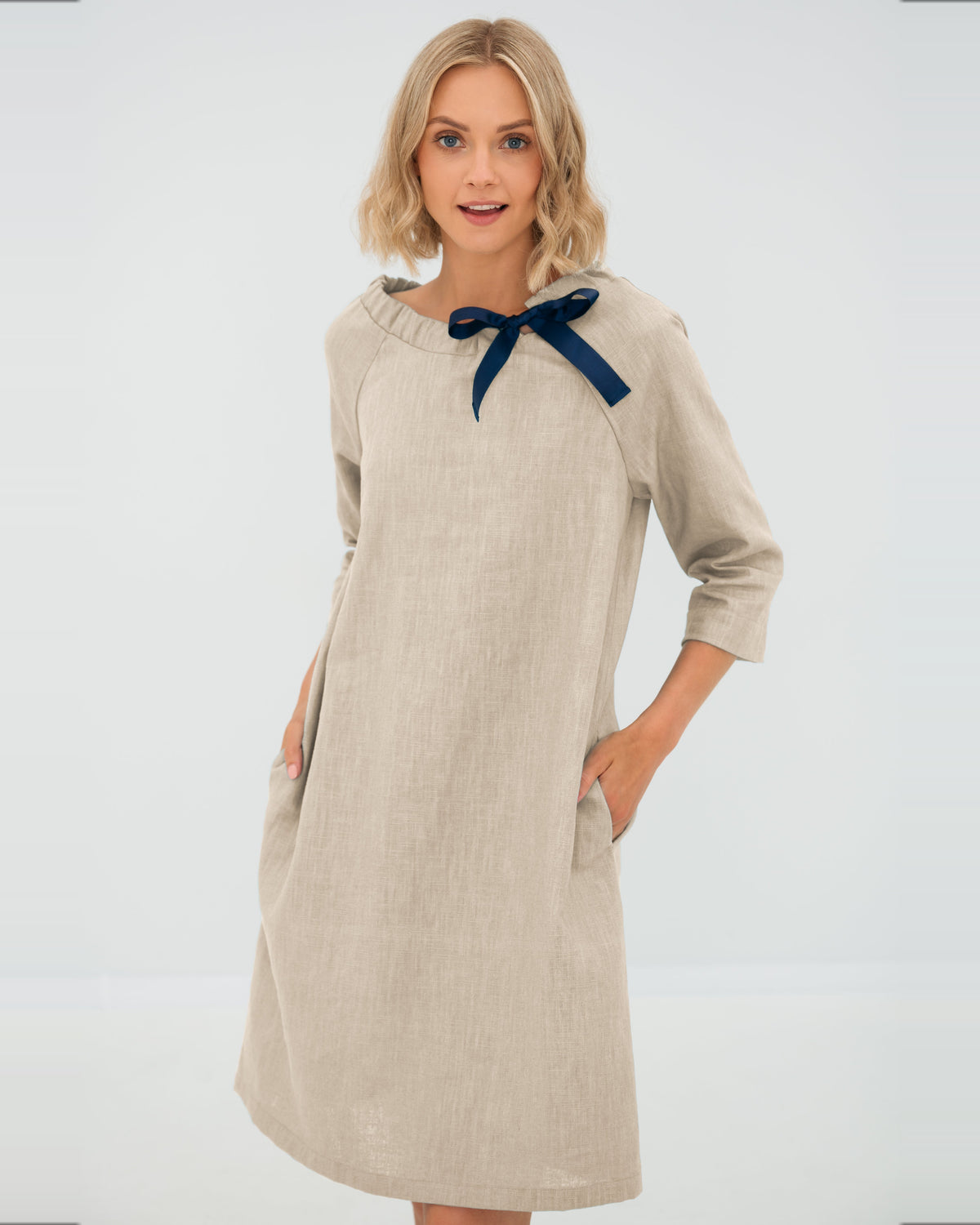 LeMuse FRENCH linen dress in beige – studio front view #Color_Beige
