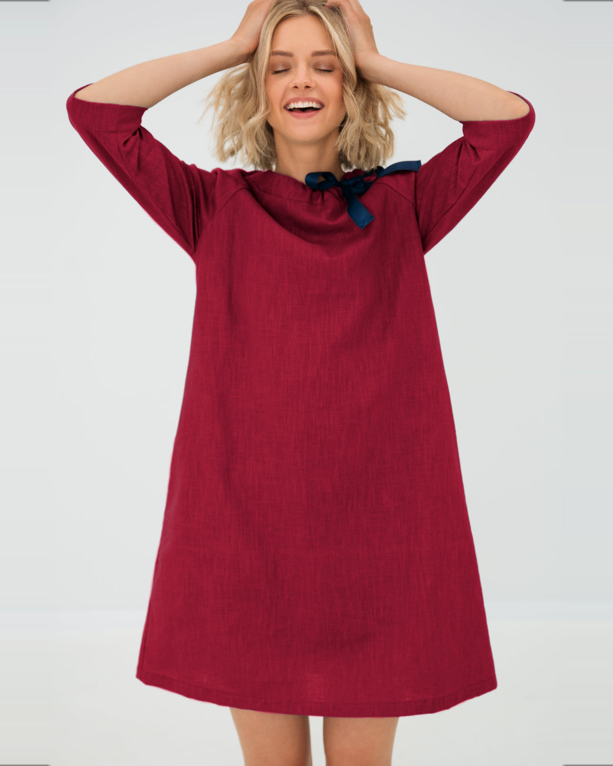 LeMuse FRENCH linen dress in cerise – model hands up in motion #Color_Cerise