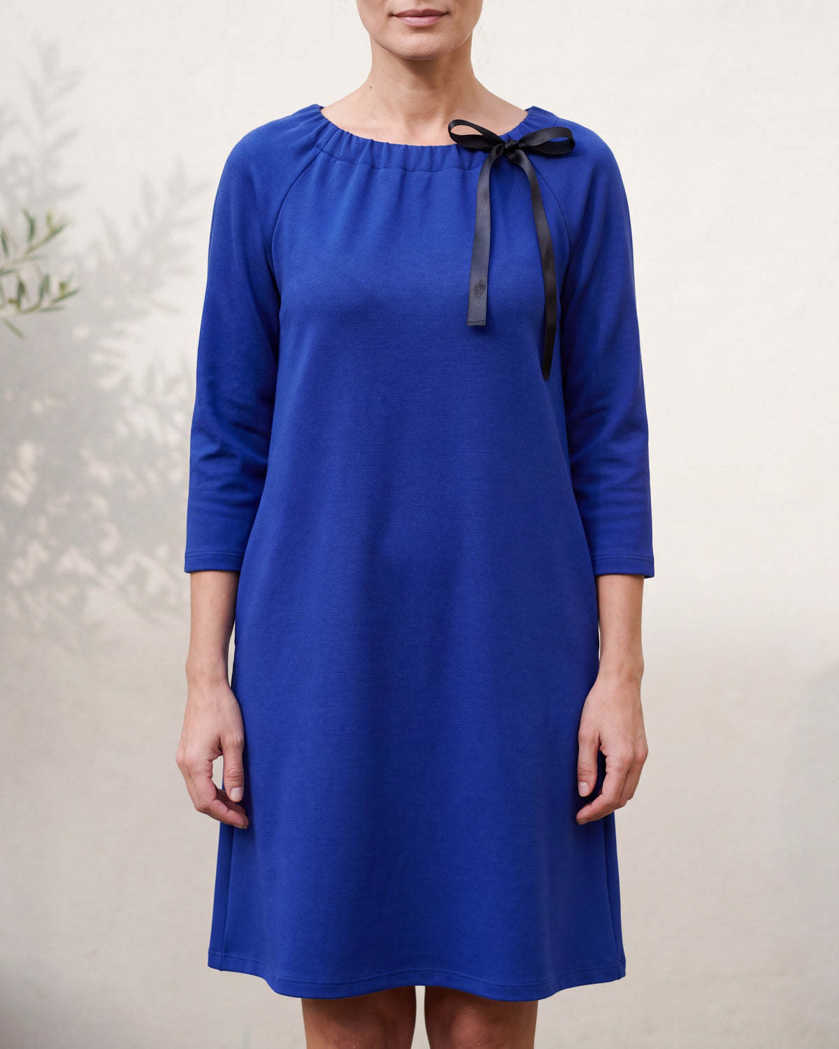 FRENCH Royal blue Punto Milano ribbon neck A-line dress, close front view