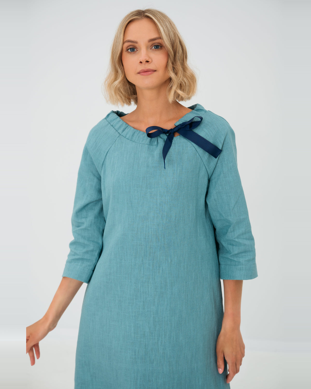 LeMuse FRENCH linen dress in teal – studio front close-up with ribbon bow #Color_Teal
