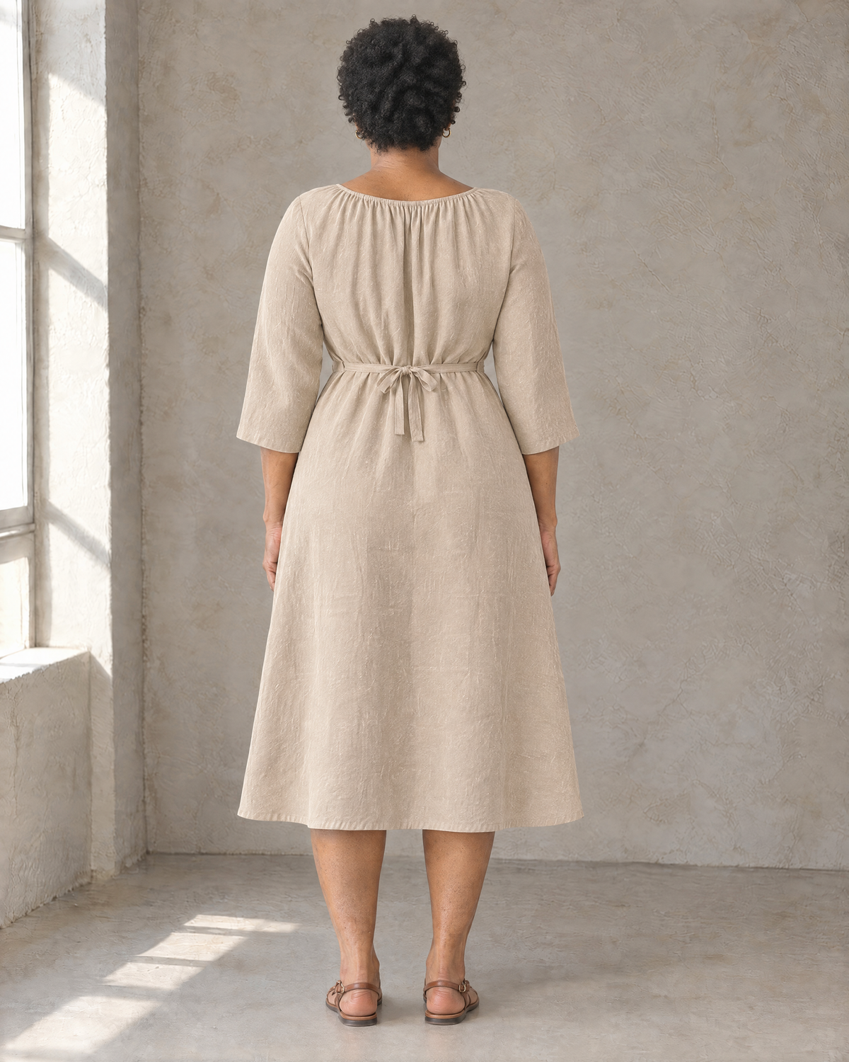 HELENA linen dress in Beige, back view with tied waist