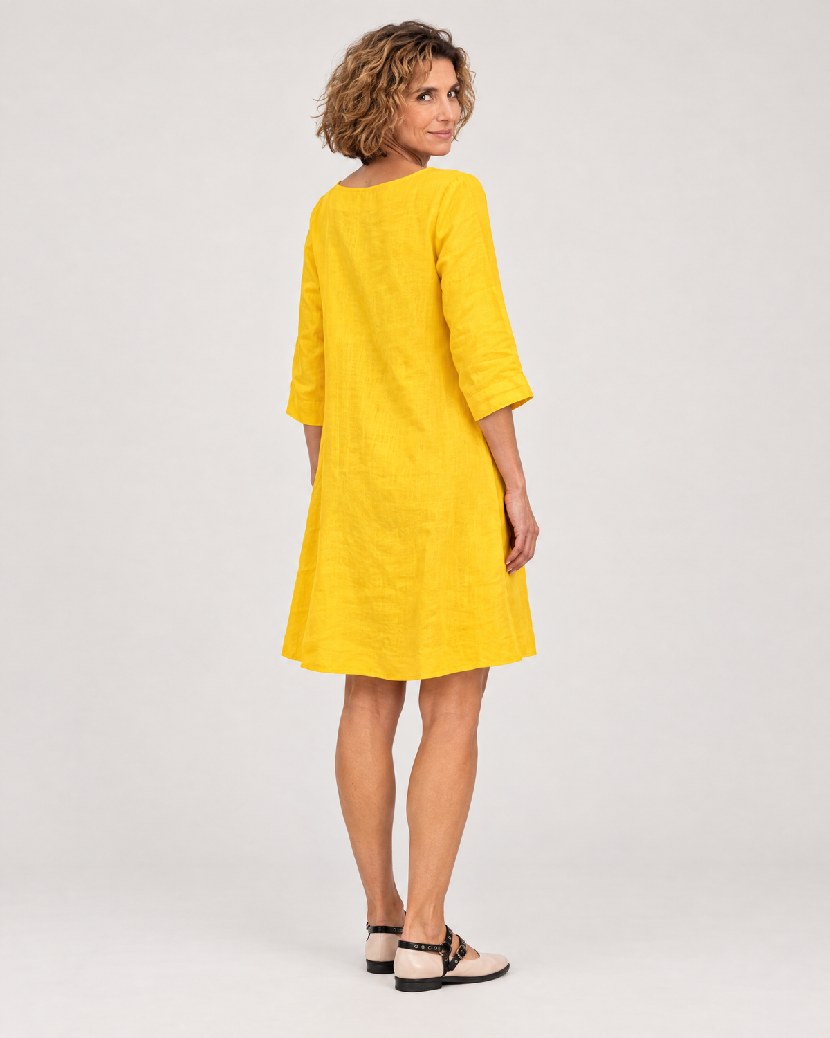 SUN – Linen Blend V-Neck Bow Dress – Yellow dress, back view over the shoulder, studio #Color_Yellow