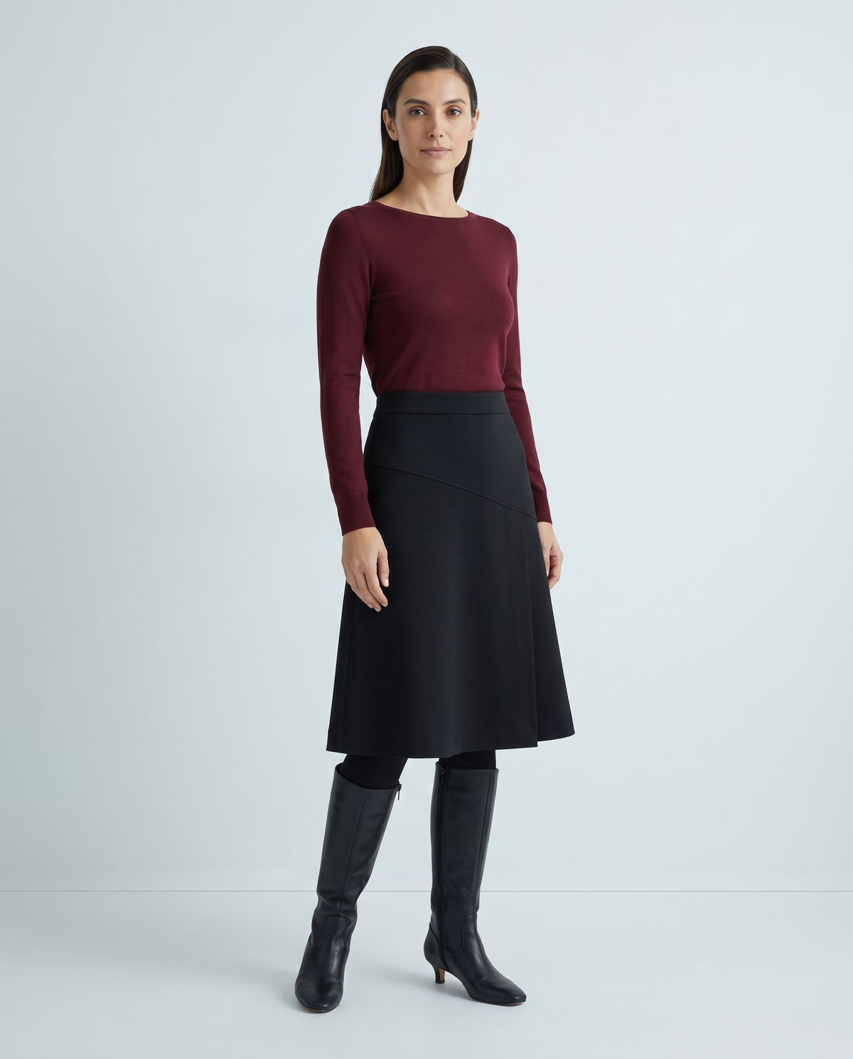 MIDNIGHT black A-line midi skirt, front view