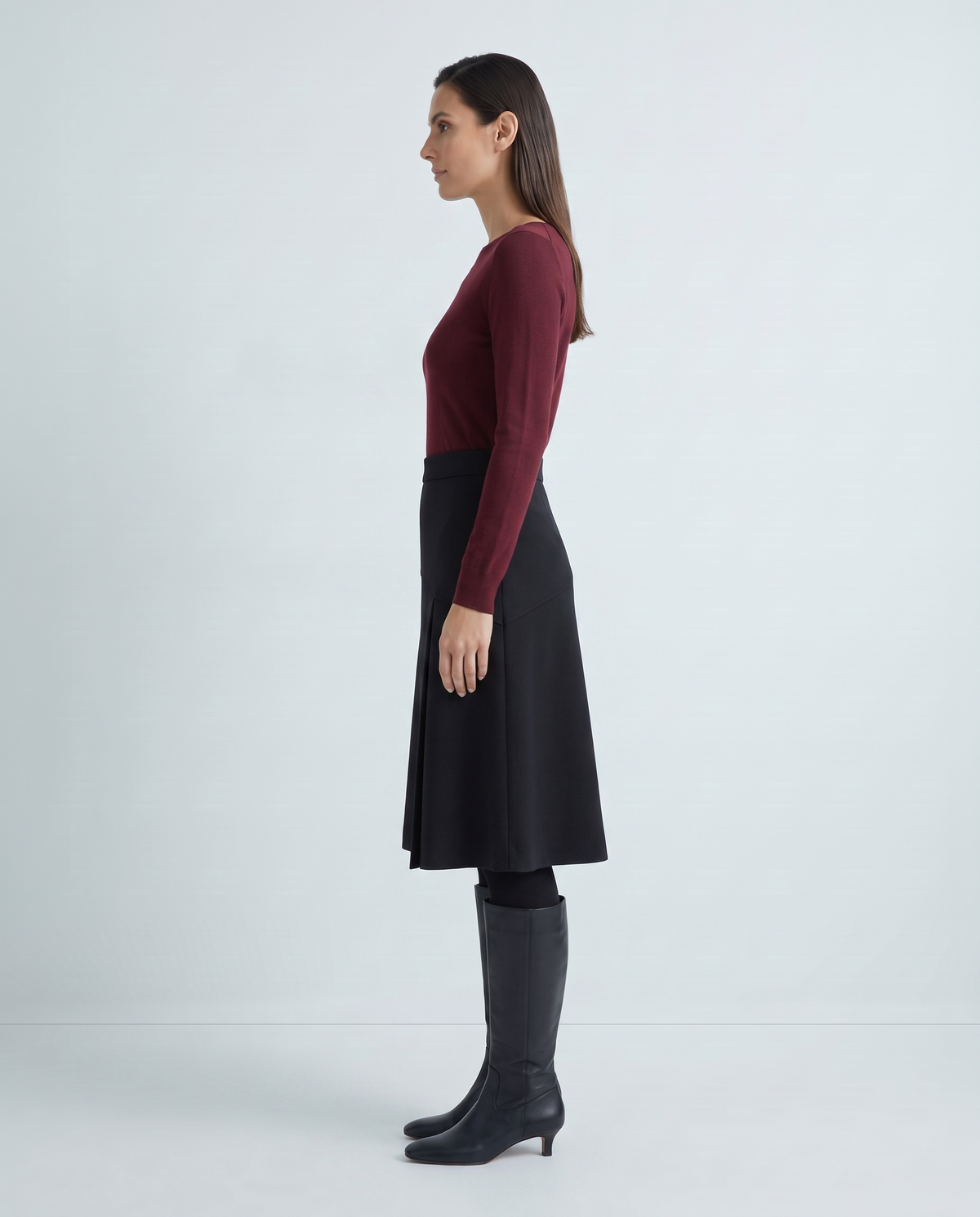 MIDNIGHT black A-line midi skirt, side view