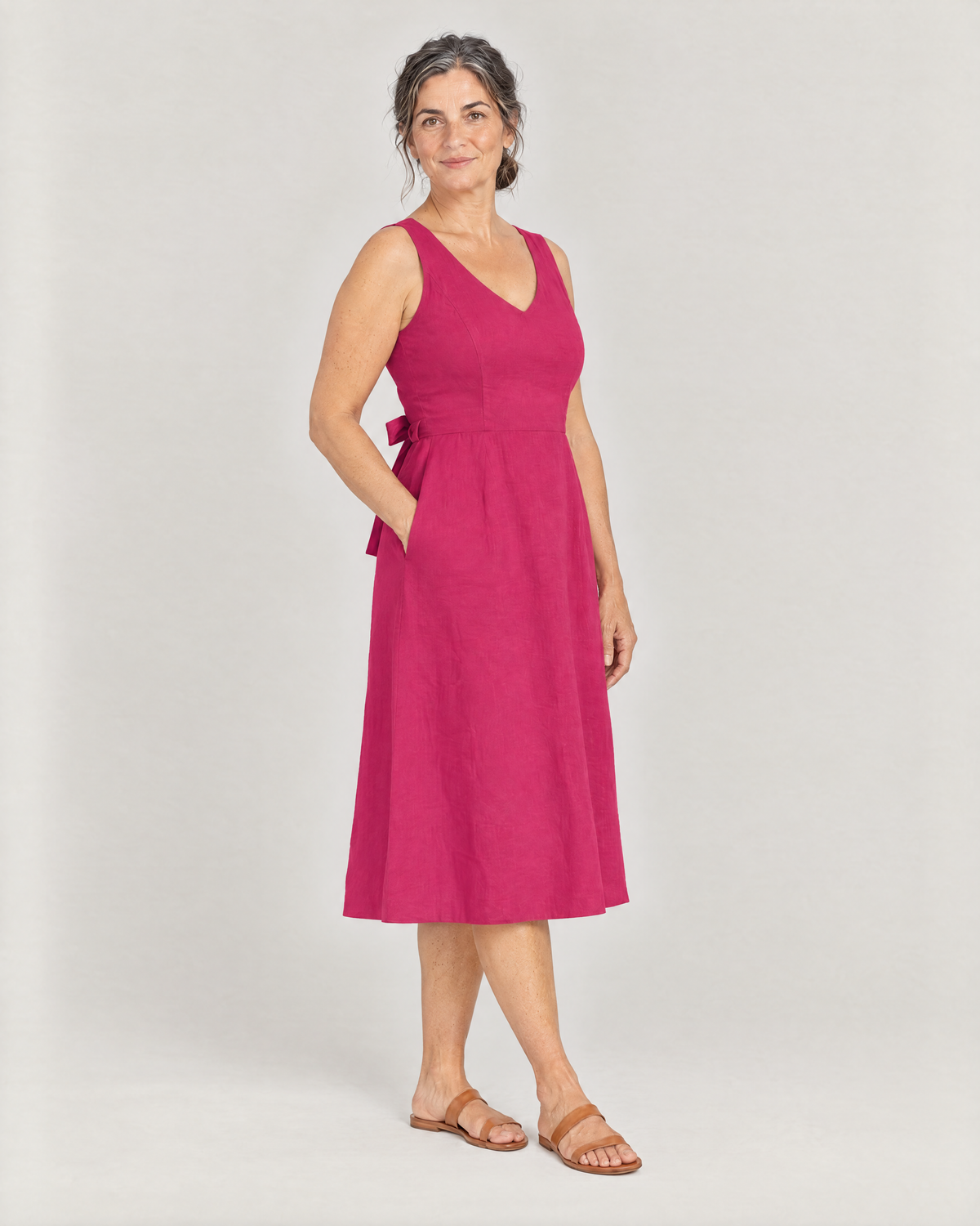 DAYLIGHT cerise linen A-line midi dress, three-quarter view