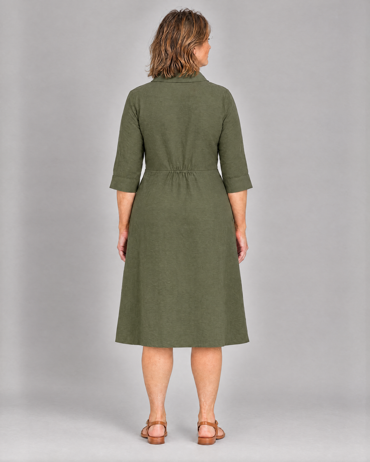 CARRY olive green linen midi shirt dress, back view with elastic at the waist