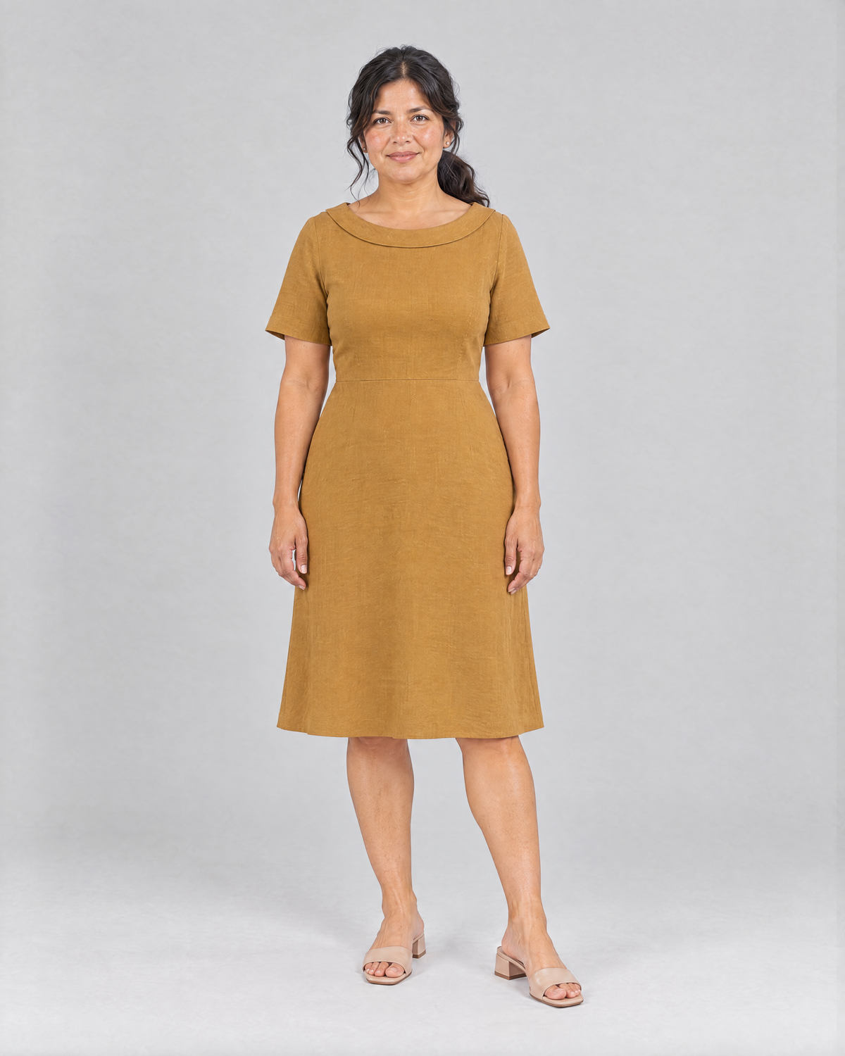STORY PETITE Dutch linen A-line dress in Ochre, front view on a petite model