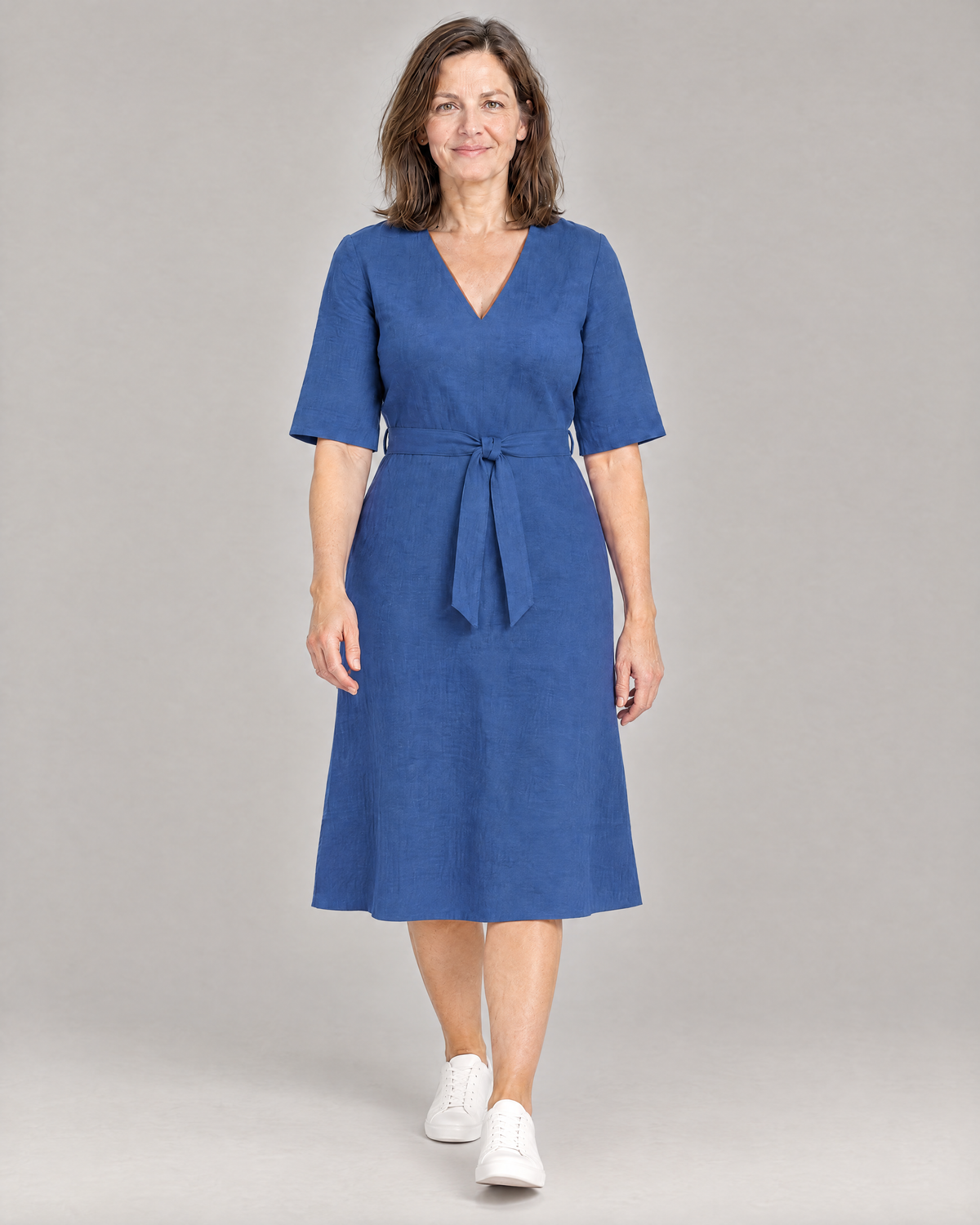 PASSPORT blue linen A-line midi dress in motion