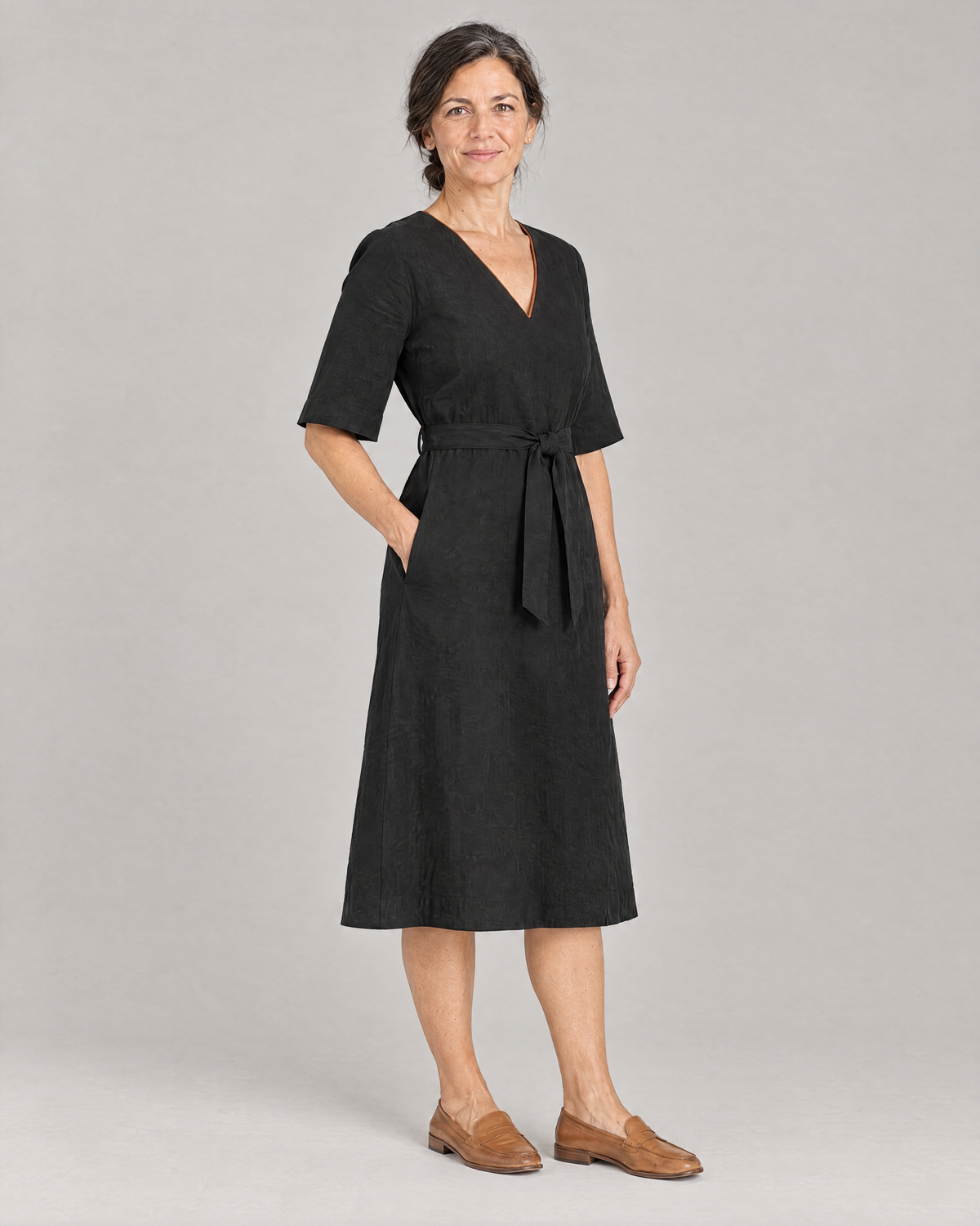 PASSPORT black linen A-line midi dress, three-quarter view